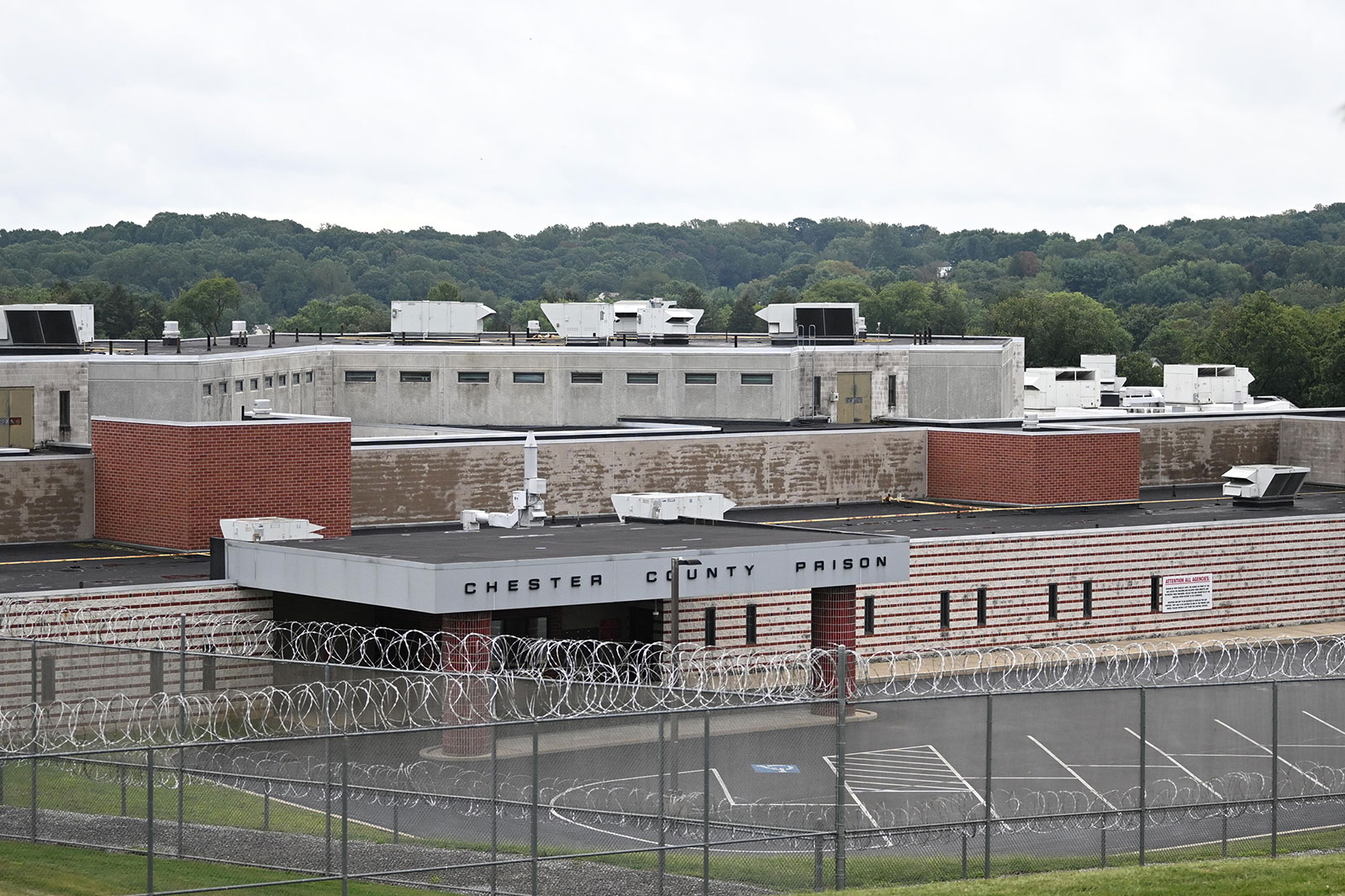 A vehicle leaves the Chester County Correctional Complex as the search  continues for Danelo Cavalcante in Pocopson Township, Pa., on Sunday, Sept.  3, 2023. Cavalcante escaped from the Chester County Prison. Cavalcante