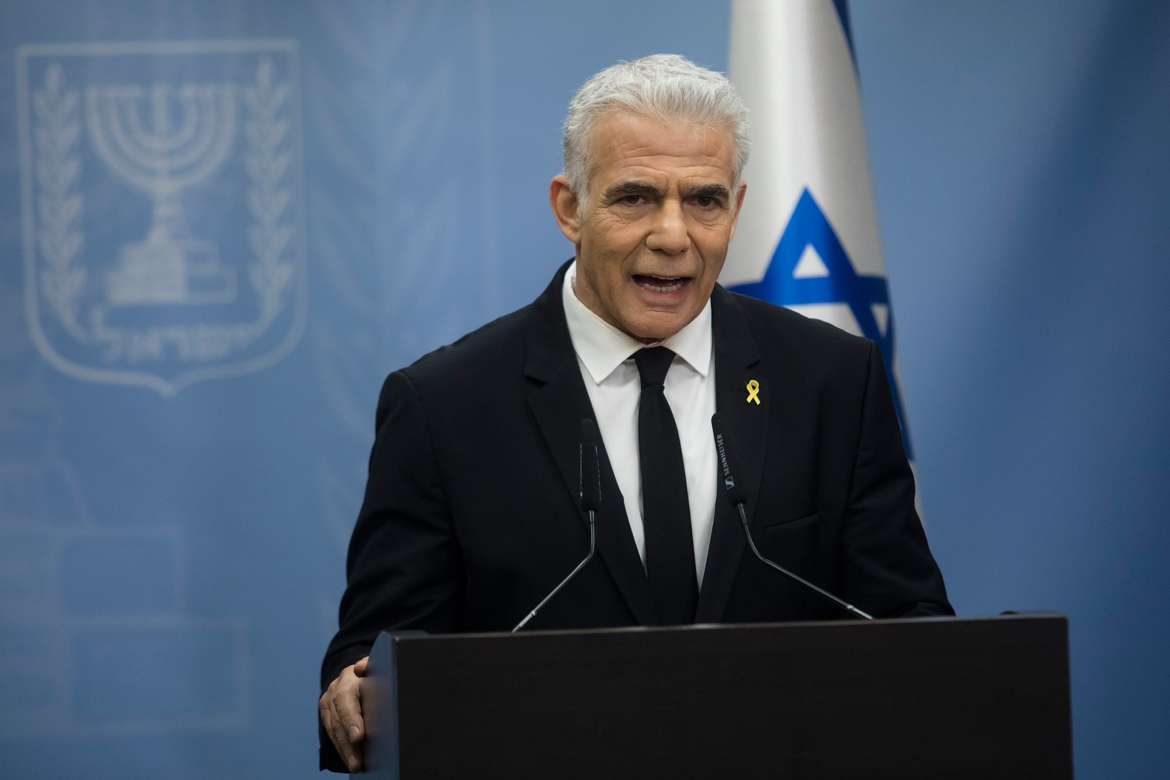 Israeli opposition and Yesh Atid party leader, Yair Lapid, speaks to the press during a party meeting on February 5, in Jerusalem. 