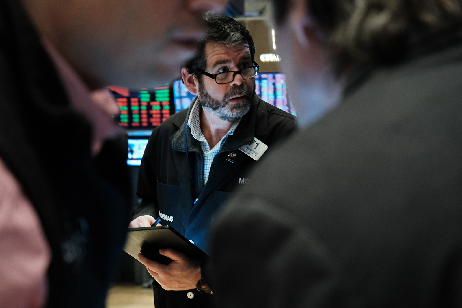 A trader works on the floor during morning trading at the New York Stock Exchange (NYSE) on March 10 in New York City. 