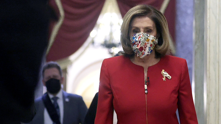 Pelosi walks down a hallway at the US Capitol on Friday, January 8, in Washington, DC. 