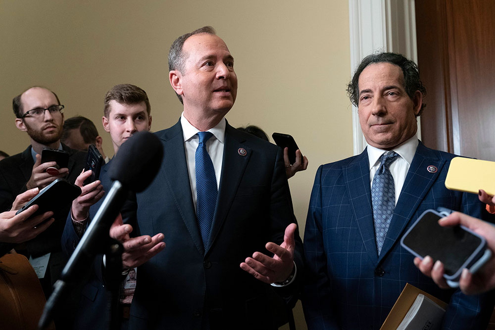 Adam Schiff and Jamie Raskin speak to reporters as they leave the House select committee investigating the January 6 attack on the U.S. Capitol final meeting on Capitol Hill in Washington, DC on Monday, December 19. 