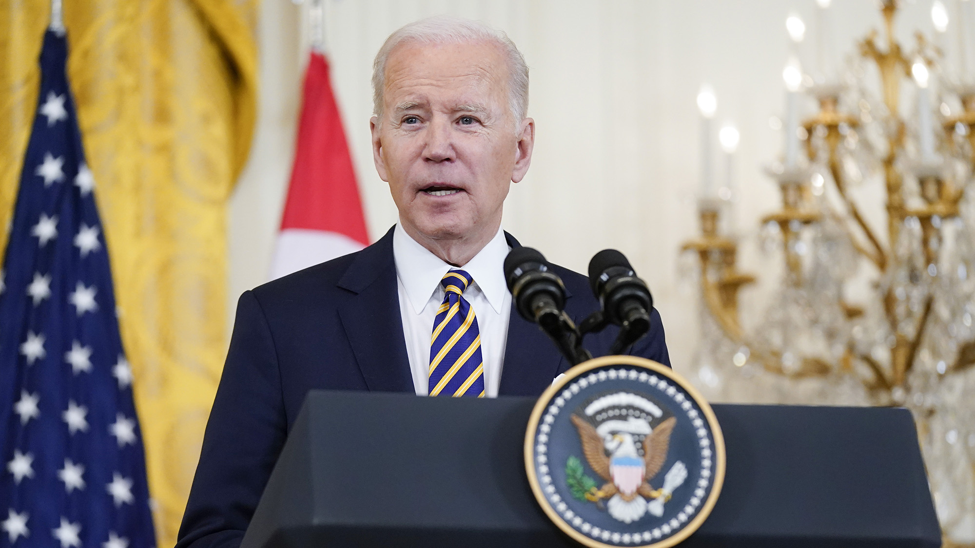 President Joe Biden speaks with the media during a visit by Singapore's Prime Minister Lee Hsien Loong in the East Room of the White House on Tuesday, March 29.