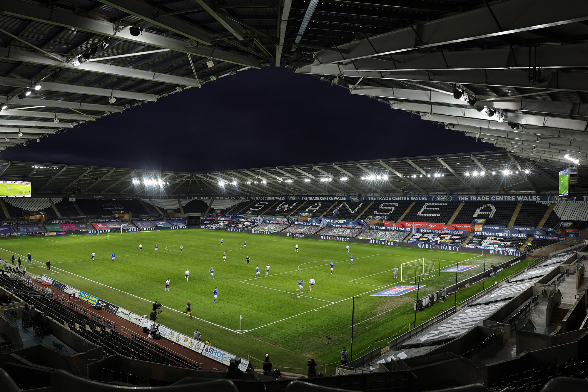 Swansea City host Welsh rivals Cardiff City in an empty Liberty Stadium the home of Swansea City during the Sky Bet Championship match between Swansea City and Cardiff City at Liberty Stadium on March 20, 2021 in Swansea, Wales. Sporting stadiums around the UK remain under strict restrictions due to the Coronavirus Pandemic as Government social distancing laws prohibit fans inside venues resulting in games being played behind closed doors. 