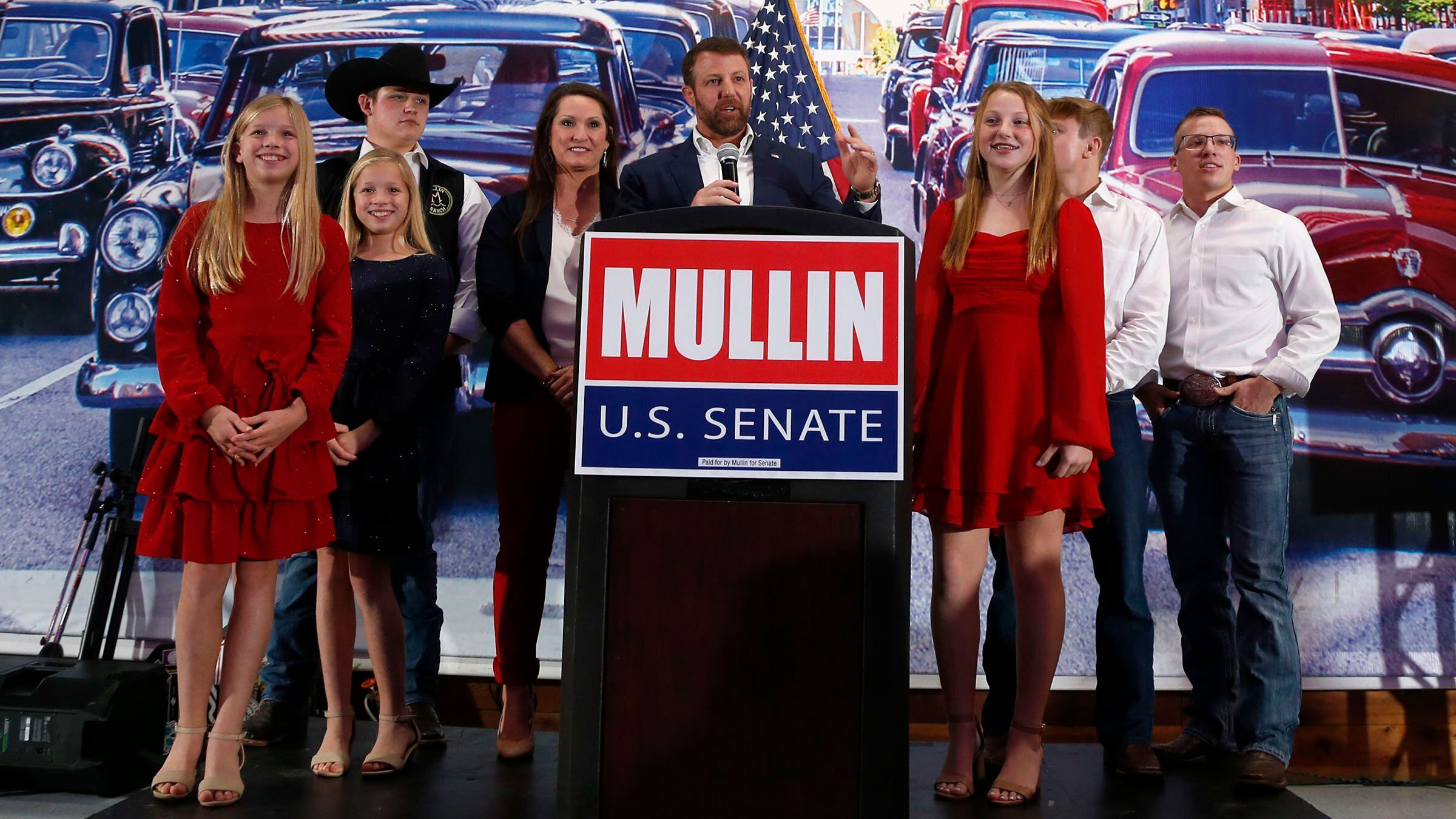 Markwayne Mullin is joined by his wife, Christie, and his children in Tulsa, Oklahoma, on Tuesday. Mullin, a Republican, will be the first Native American senator from Oklahoma in almost 100 years, CNN projects, winning the special election to succeed GOP Sen. Jim Inhofe.