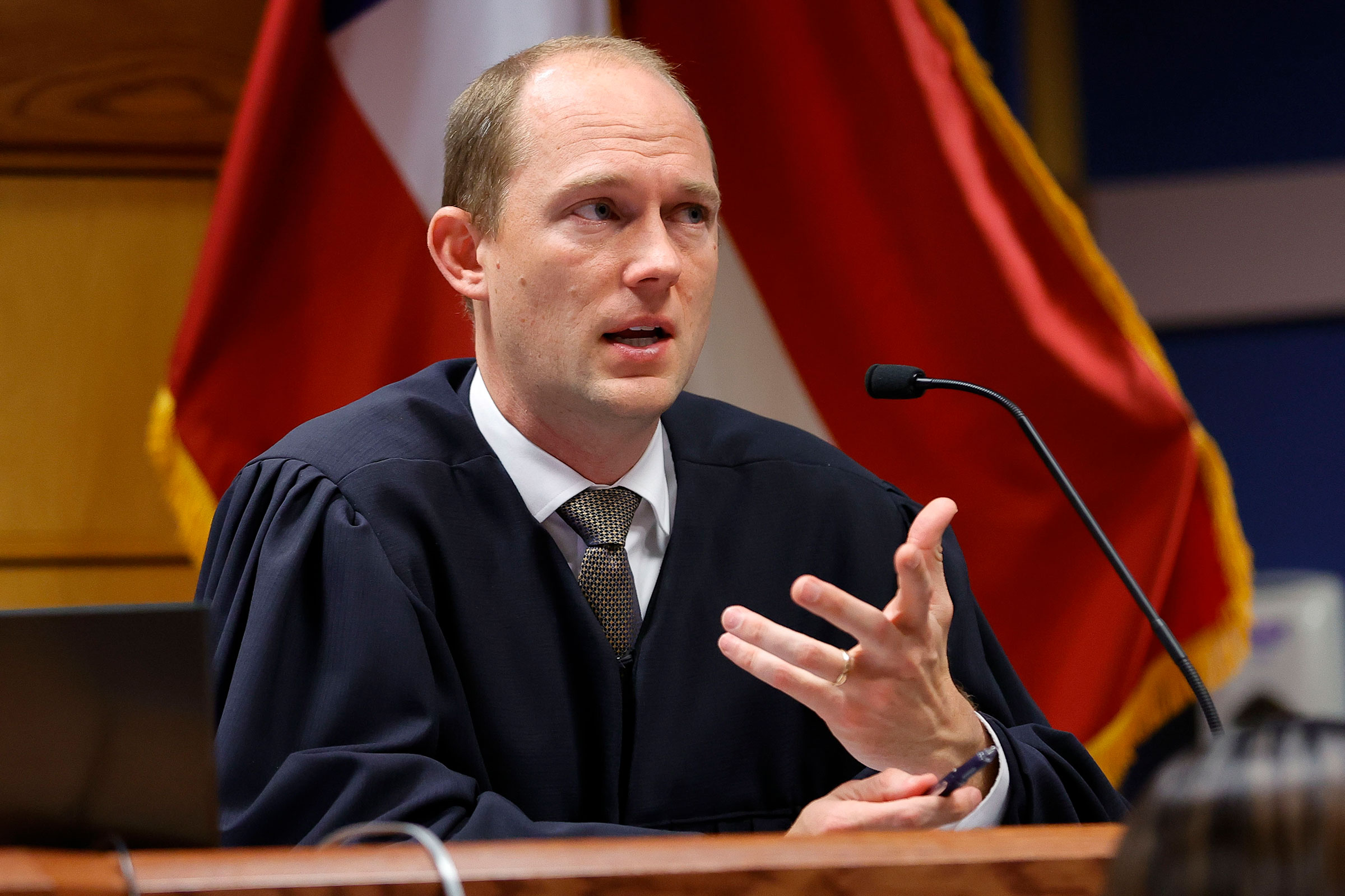 Fulton County Superior Judge Scott McAfee presides in court during a hearing in the case of the State of Georgia v. Donald John Trump at the Fulton County Courthouse on March 1 in Atlanta.