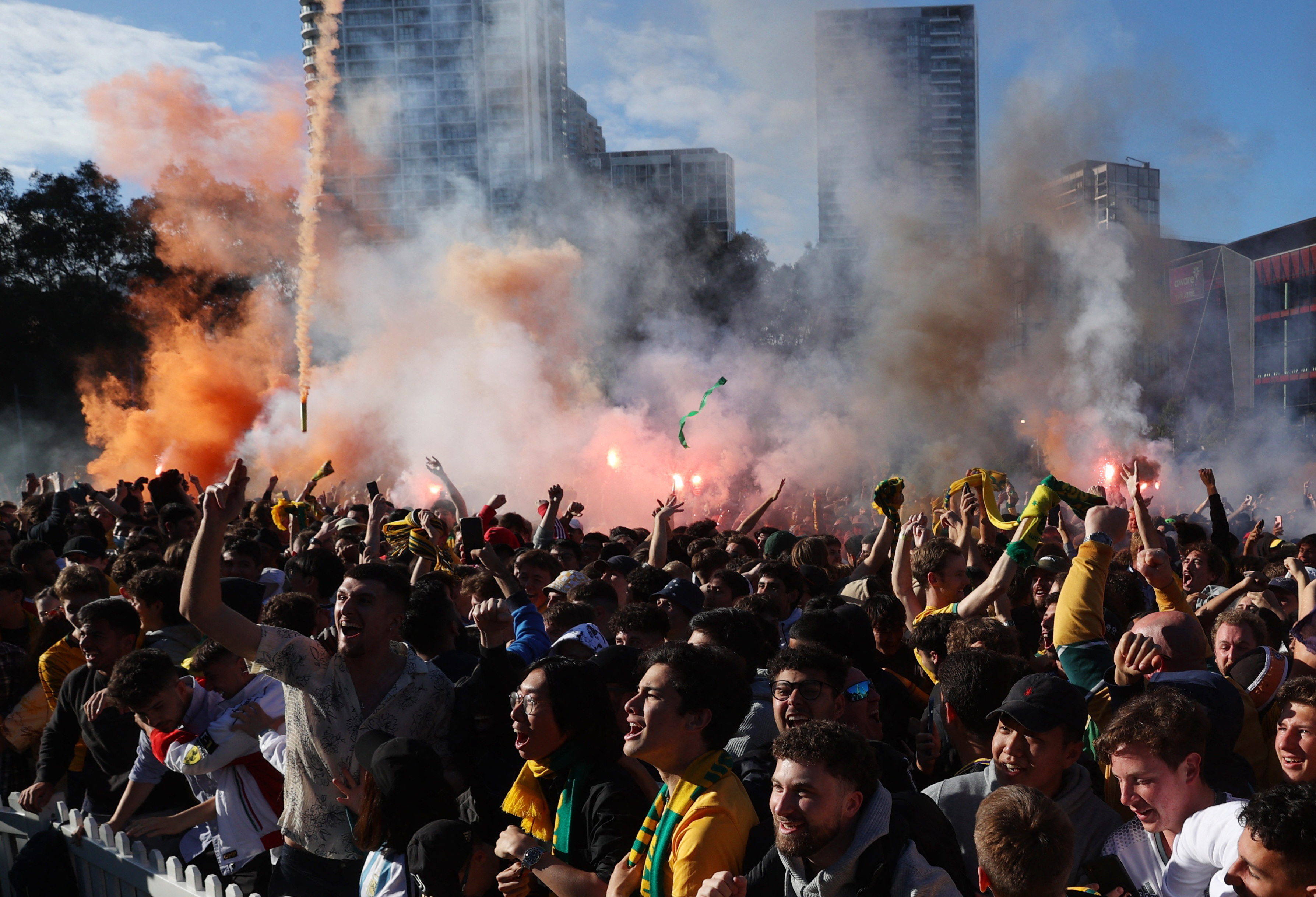 Australia fans celebrate their first goal during the match between Australia and Argentina in Sydney, Australia on Sunday, December 4.
