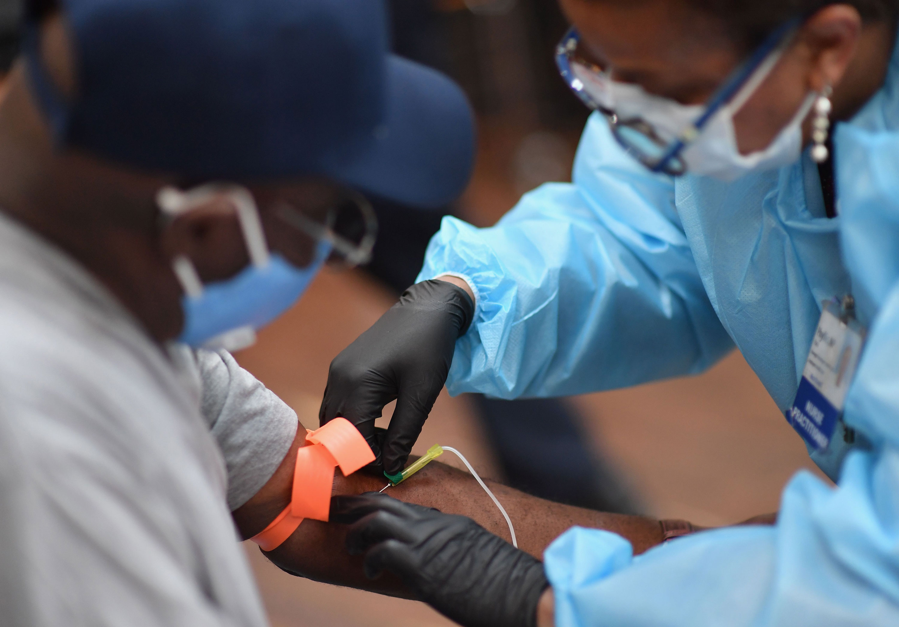 A registered nurse draws blood to test for COVID-19 antibodies at Abyssinian Baptist Church in the Harlem neighborhood of New York City on May 14.