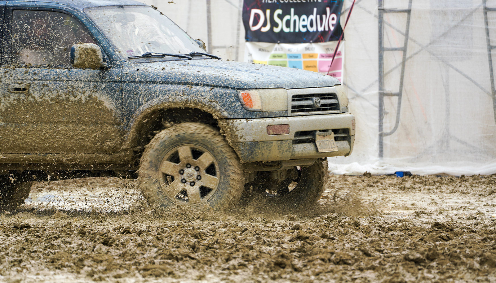 A motorist attempts to drive through mud at Burning Man festival on September 2. 