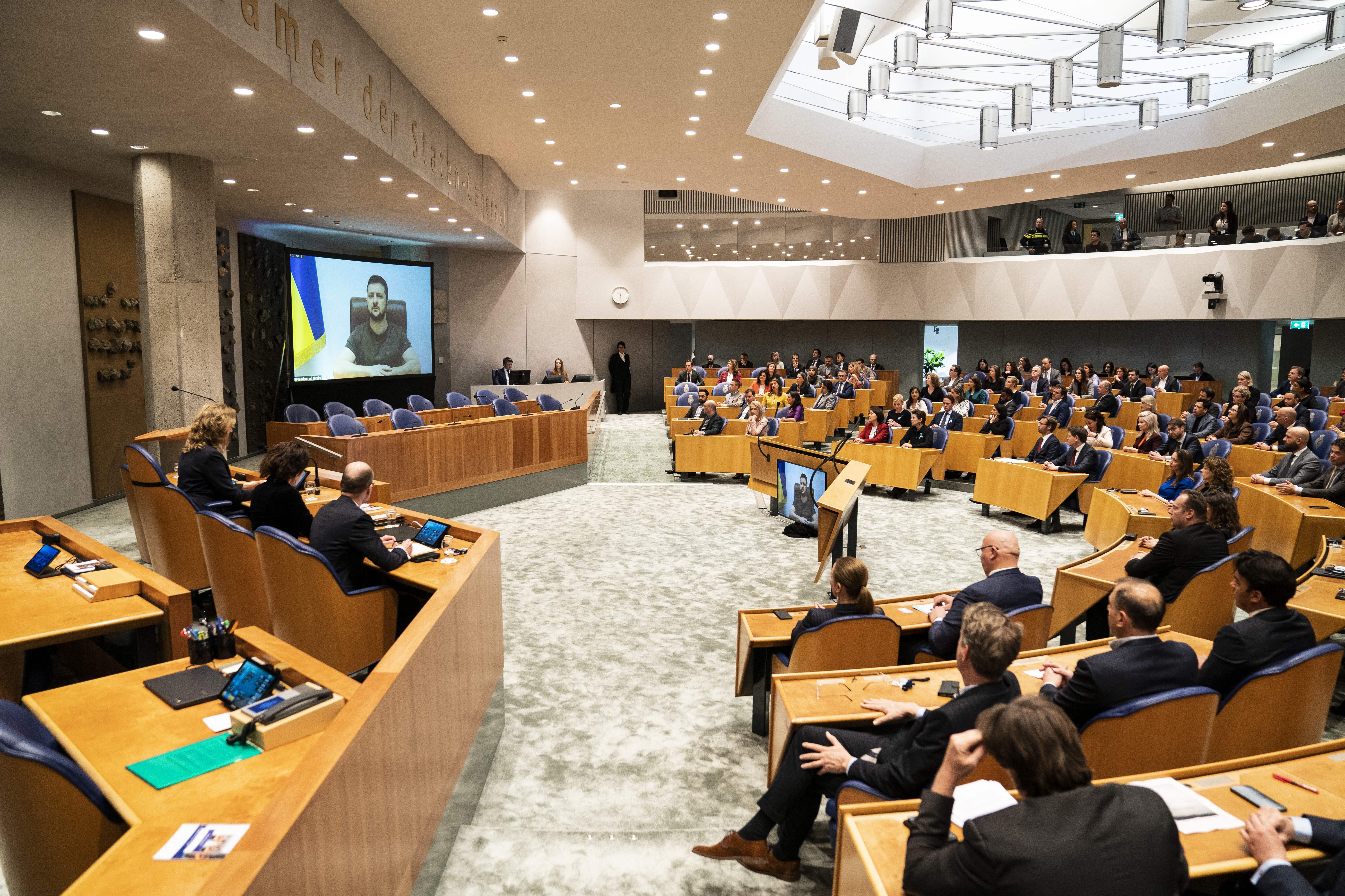 Ukrainian President Volodymyr Zelensky addresses the Dutch House of Representatives in The Hague, Netherlands, on March 31.