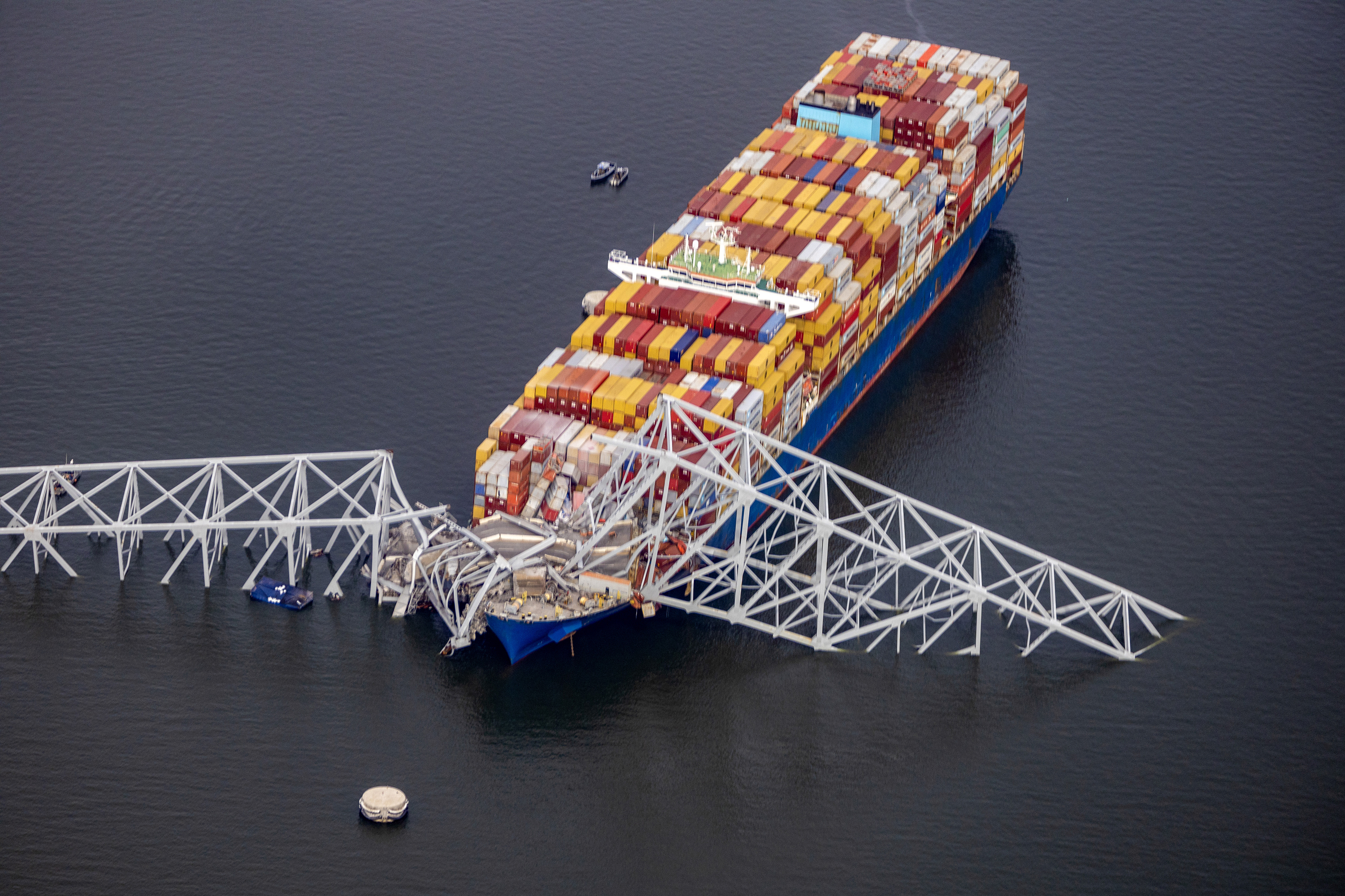 In an aerial view, cargo ship Dali is seen after running into and collapsing the Francis Scott Key Bridge on March 26, in Baltimore, Maryland.