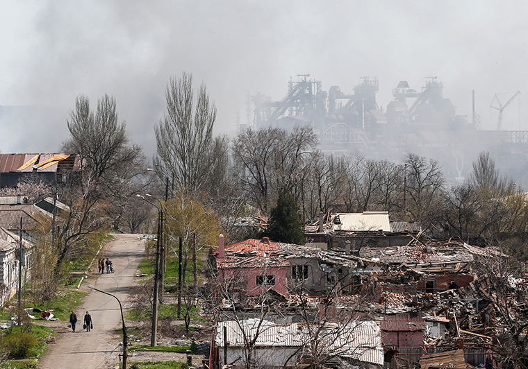 Smoke rises above the Azovstal Iron and Steel Works company and buildings in Mariupol, Ukraine, on Monday, April 18,