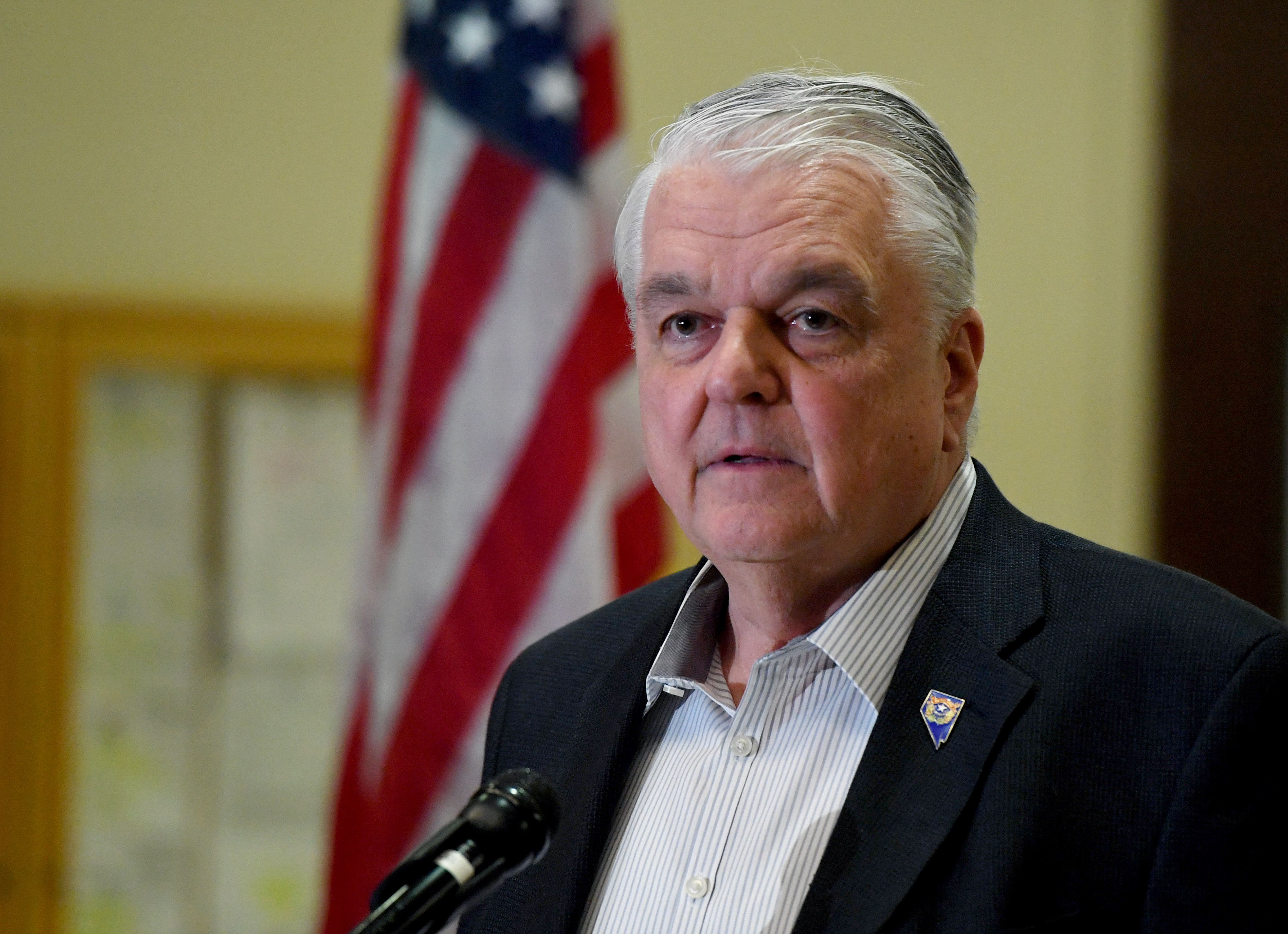 Nevada Gov. Steve Sisolak speaks during a news conference in Las Vegas on March 17.