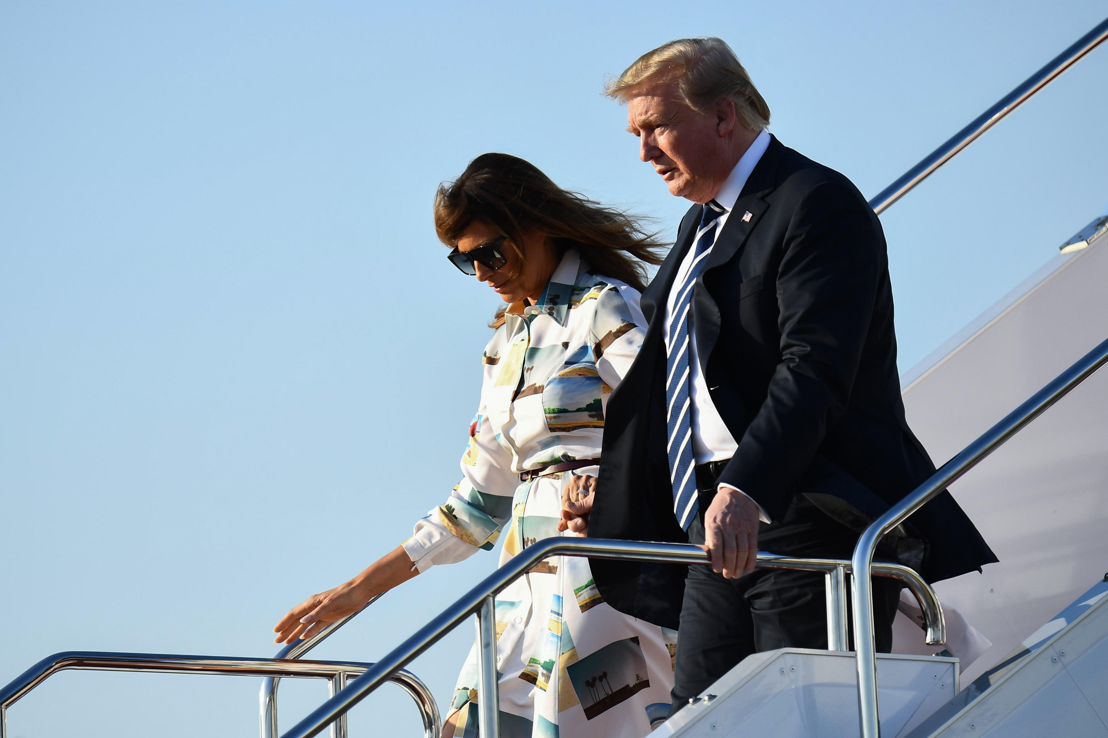 President Trump is accompanied by first lady Melania Trump.