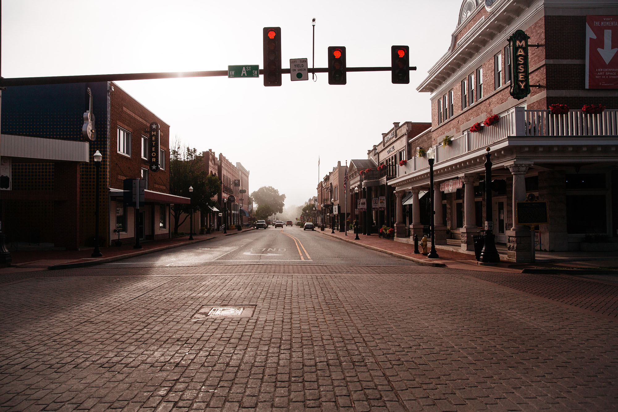 A nearly empty downtown street stands in Bentonville, Arkansas, on Thursday, May 28, 2020. 