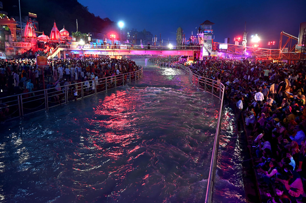 Hindu devotees gather on the banks of Ganges River during the Kumbh Mela festival in Haridwar on April 11.