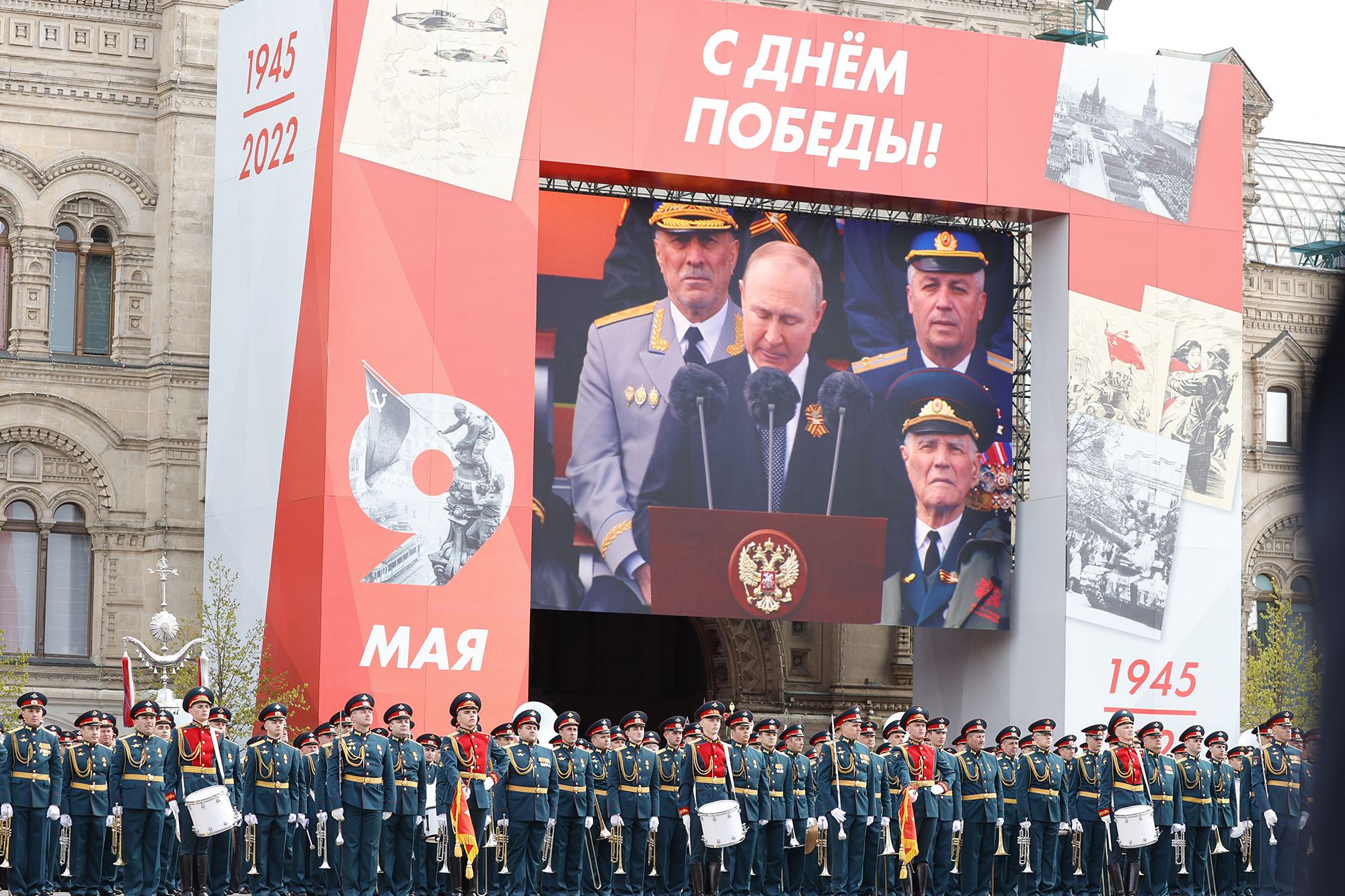 Russian President Vladimir Putin is seen on the screen as he delivers a speech during 77th anniversary of the Victory Day in Red Square in Moscow, Russia, on May 9.