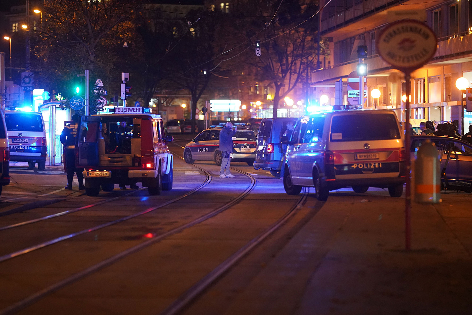 Police cars and ambulances stand in the central Vienna on November 2, following a shooting near a synagogue.