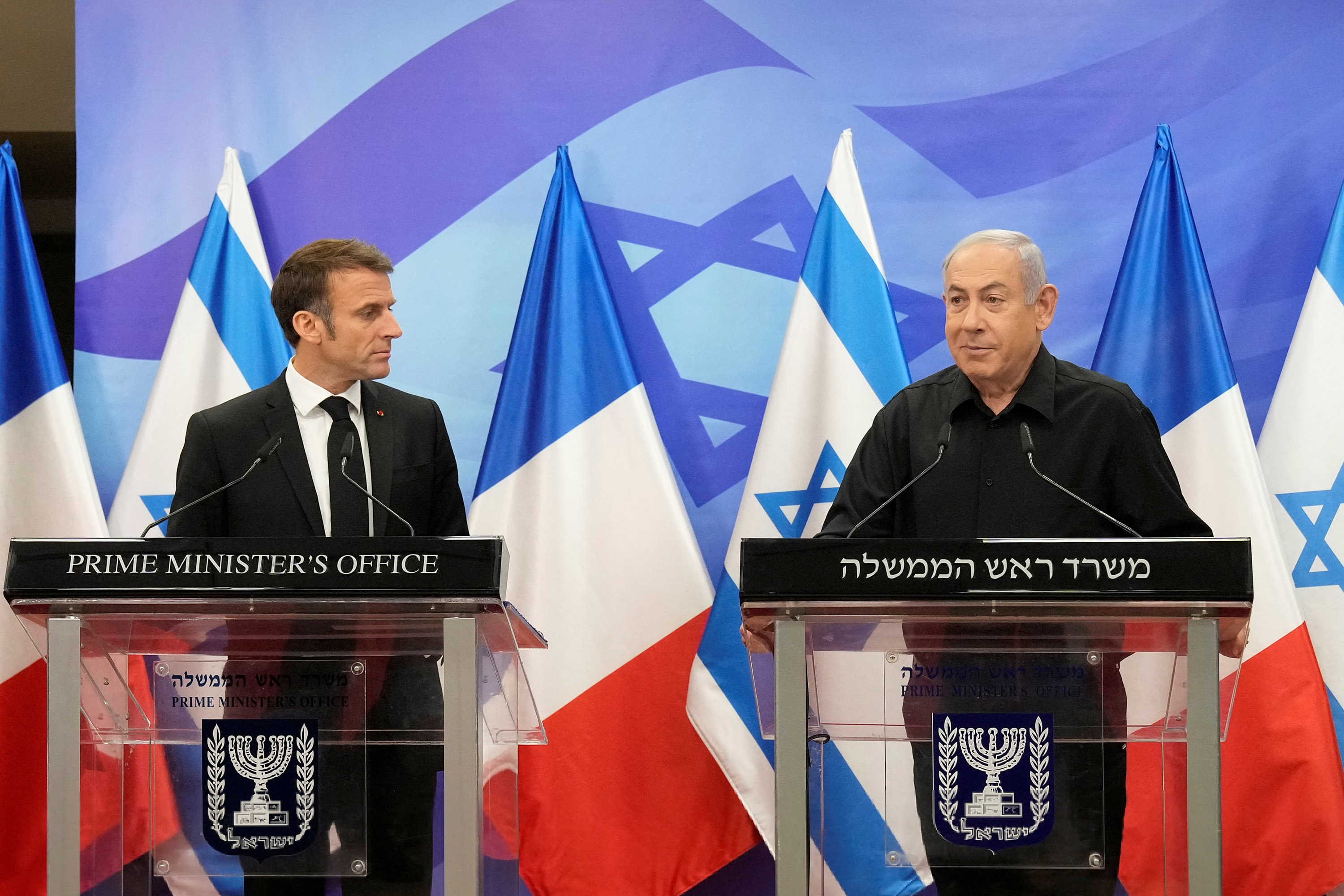 Israeli Prime Minister Benjamin Netanyahu, right, speaks during a joint press conference with French President Emmanuel Macron in Jerusalem, on October 24. 