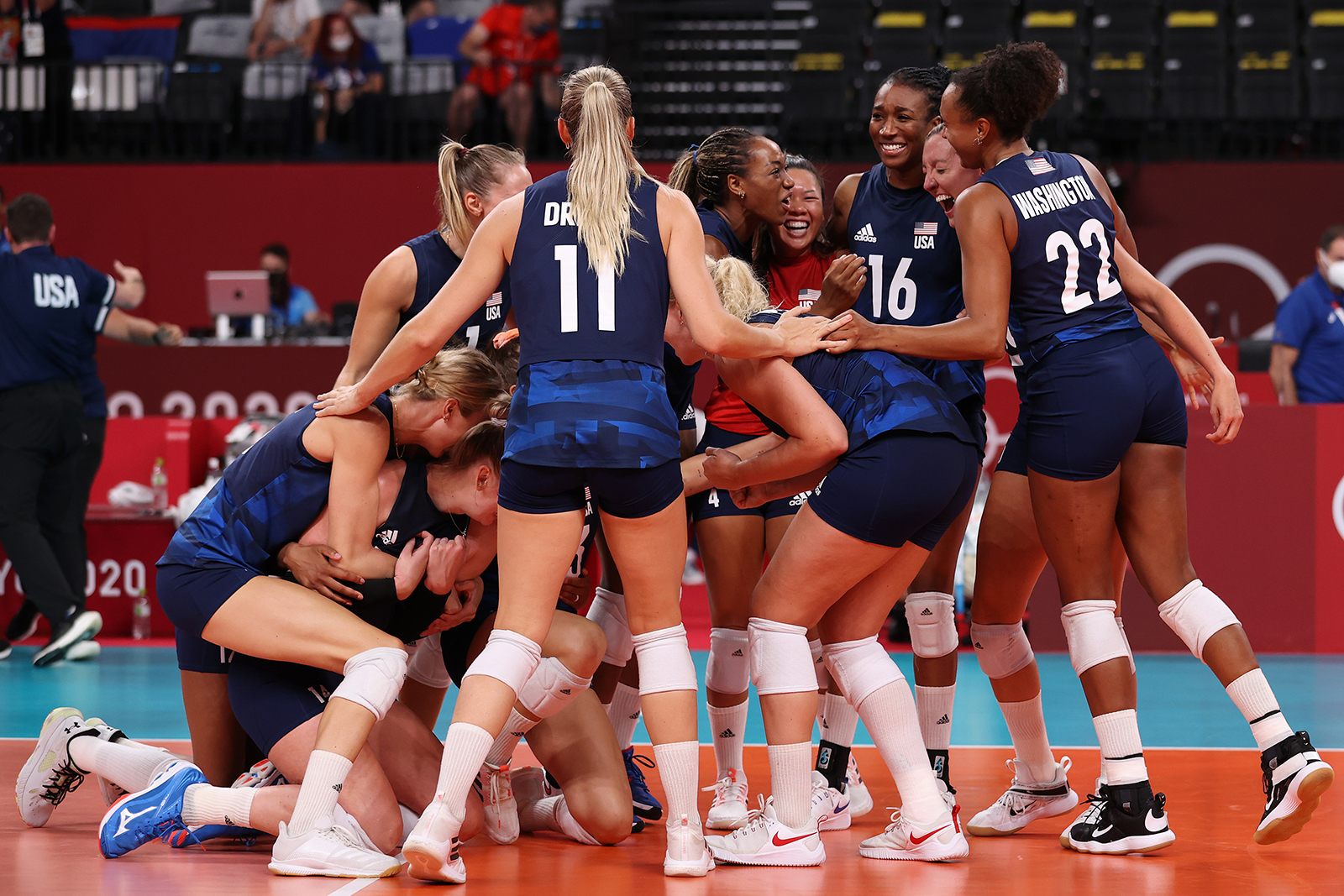 Team United States celebrates after defeating Team Serbia during their volleyball semifinal match on Friday.