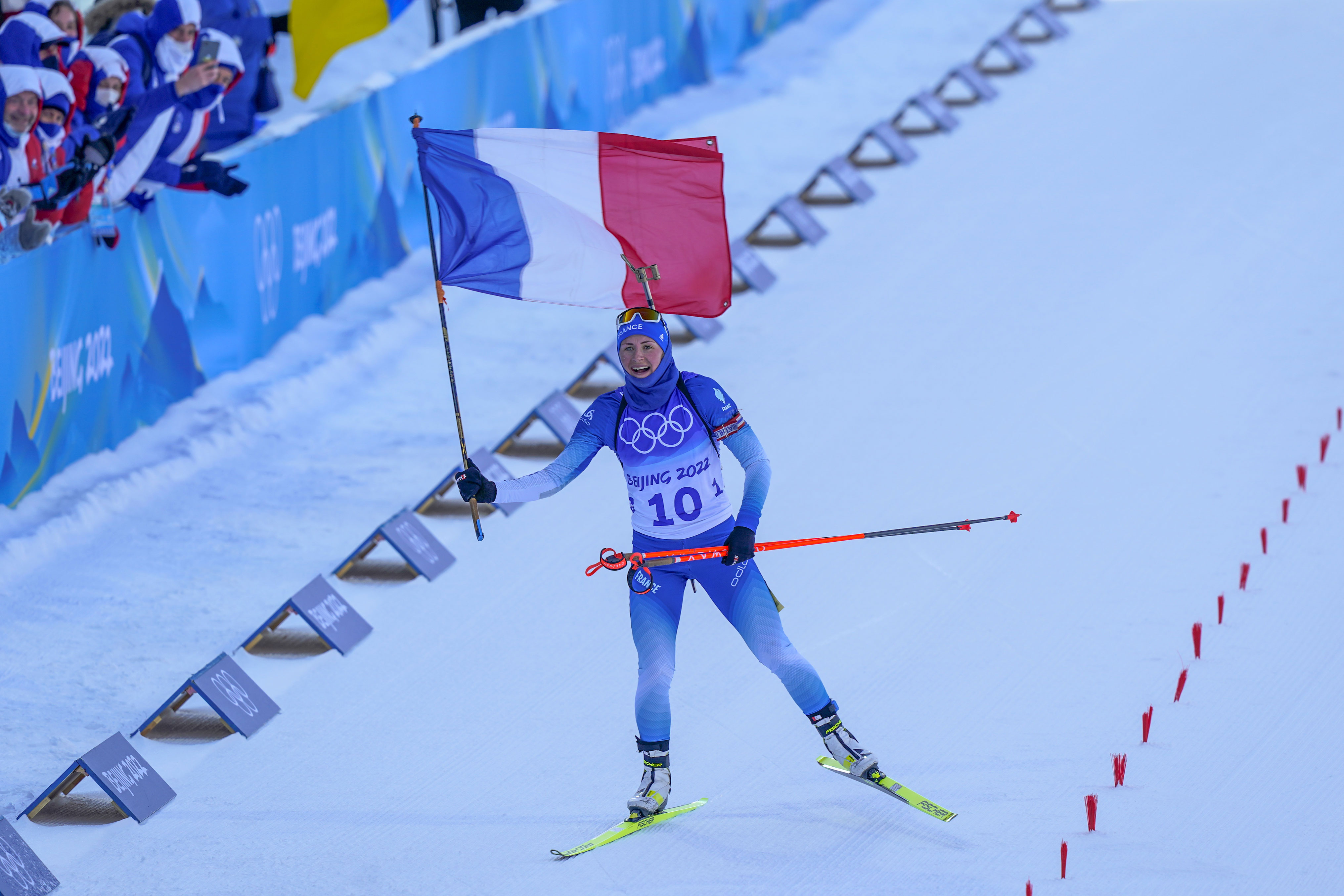 France's Justine Braisaz-Bouchet wins the gold medal during the women's biathlon mass start on Feb. 18.