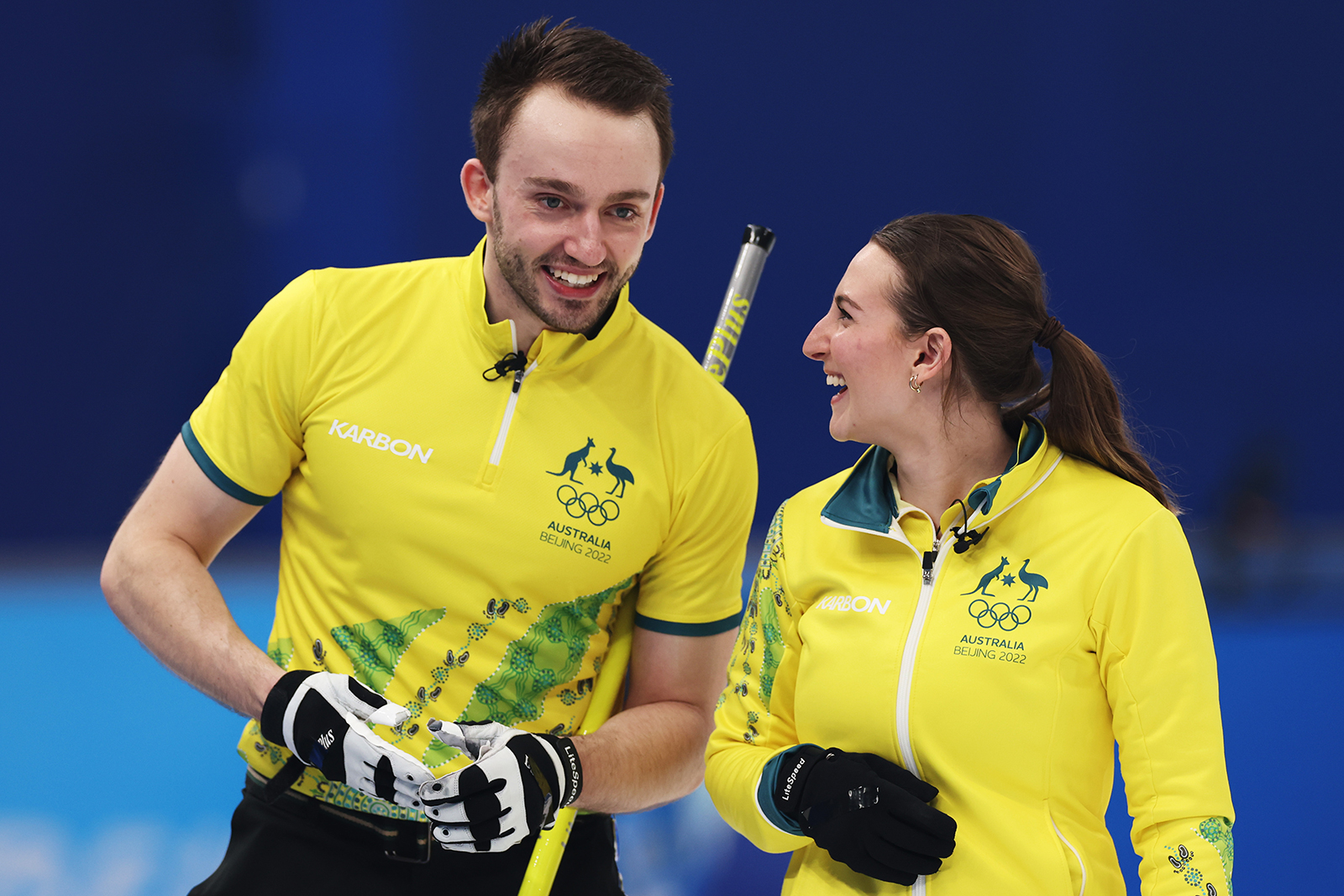 Dean Hewitt and Tahli Gill of Team Australia celebrate their victory against Team Canada during the curling mixed doubles round robin on Day 2 on Sunday.
