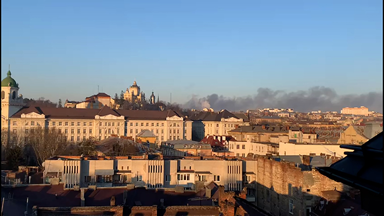 Smoke is seen on the horizon in Lviv.