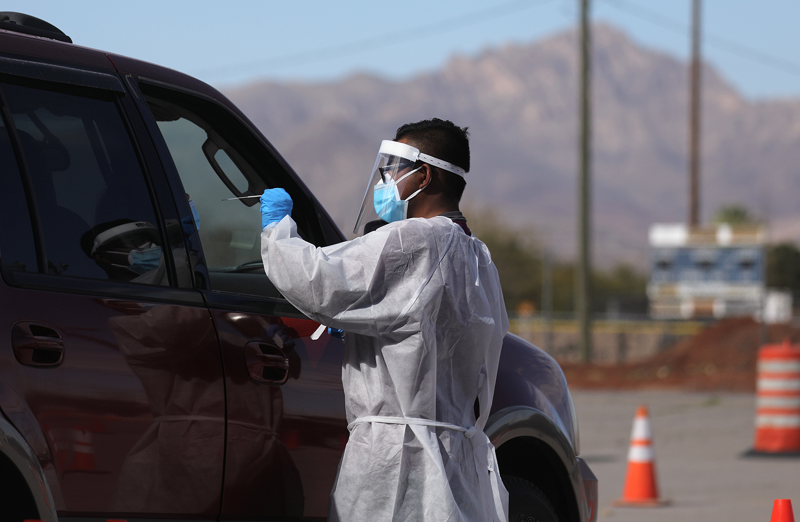 A frontline healthcare worker administers a swab test at a Covid-19 testing site amid a surge of coronavirus cases in El Paso, Texas, on November 13.