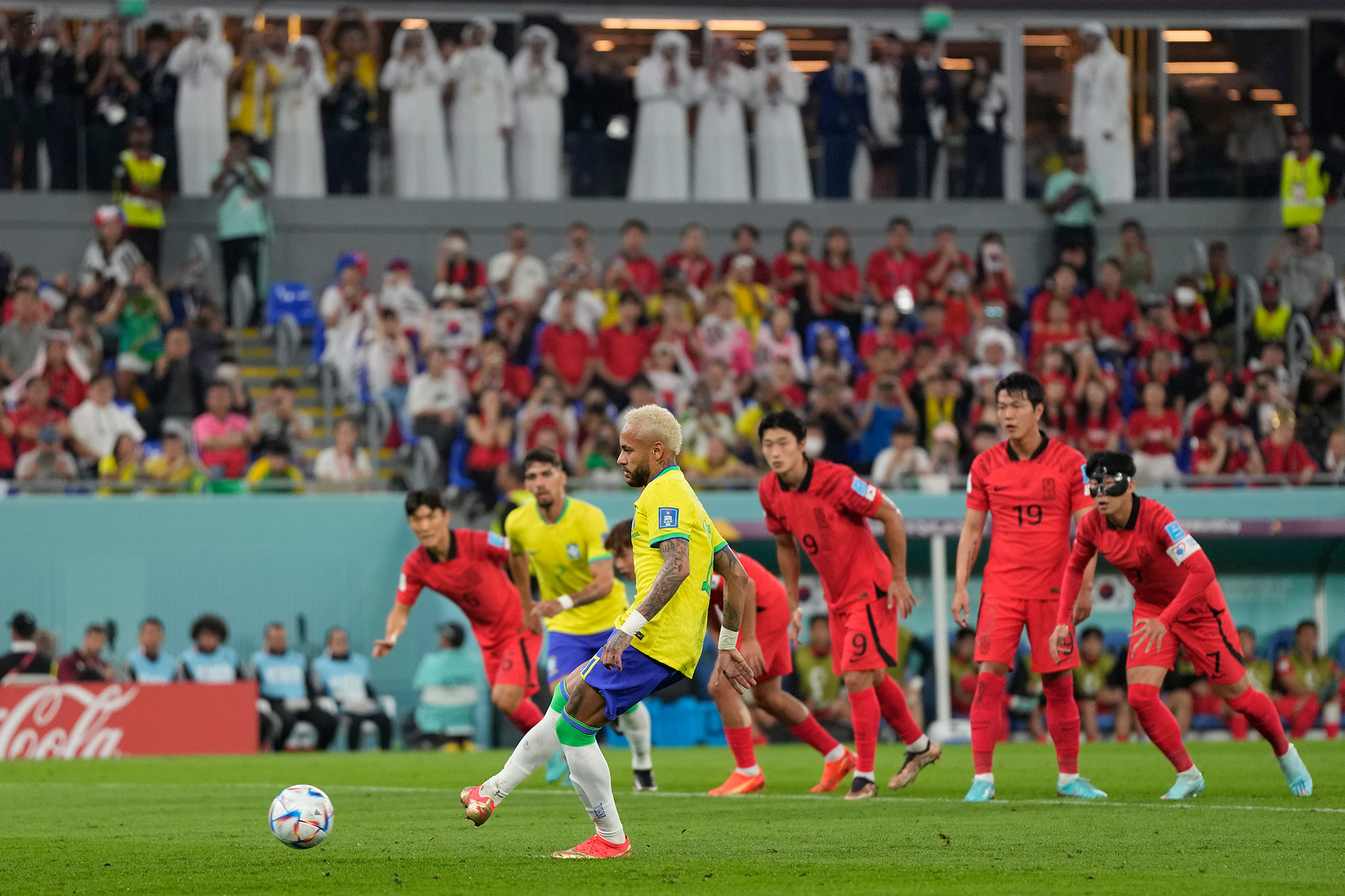 Brazil's Neymar scores his side's second goal with a penalty kick.