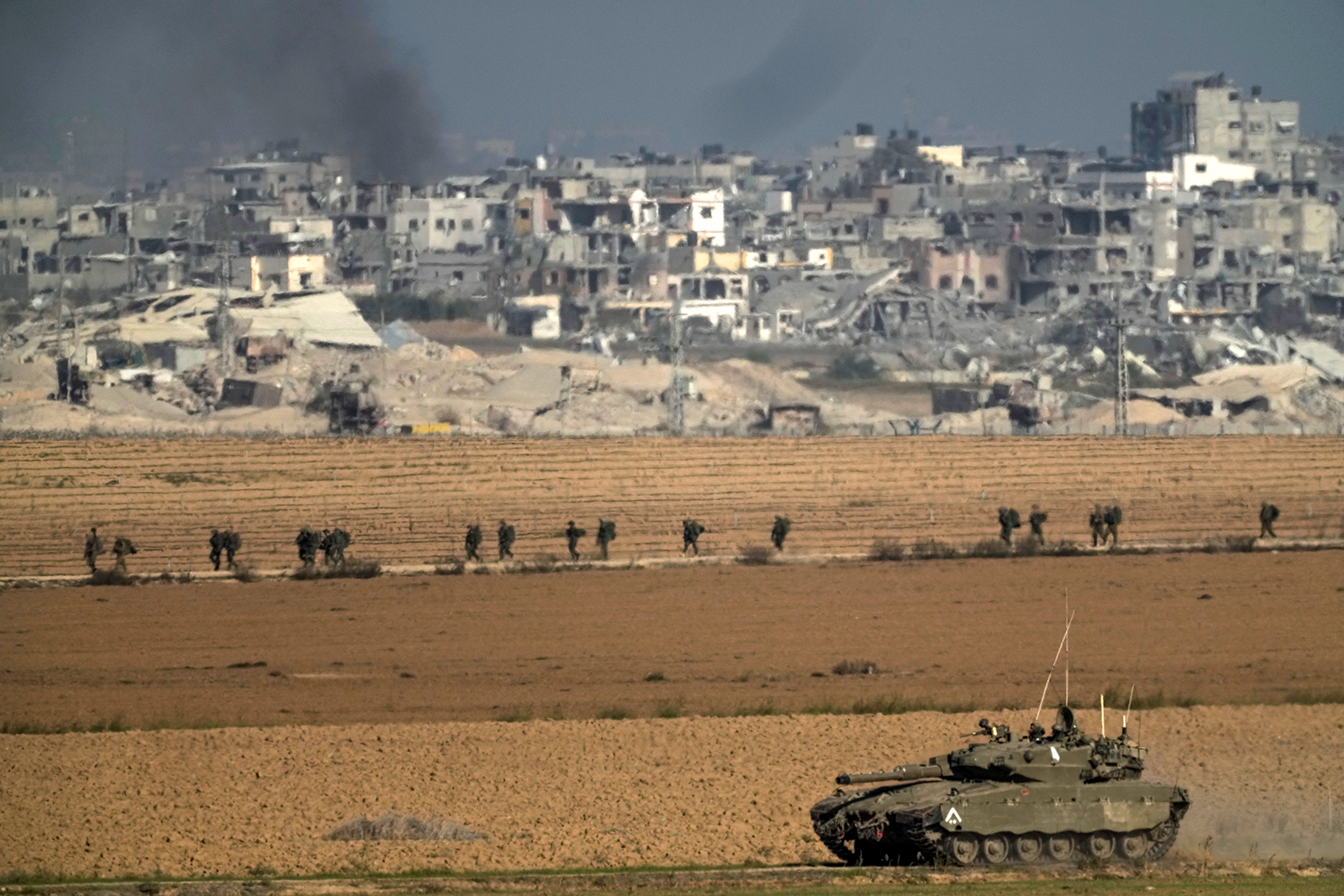 Israeli troops are seen near the Israel-Gaza border on Sunday, December 10. 