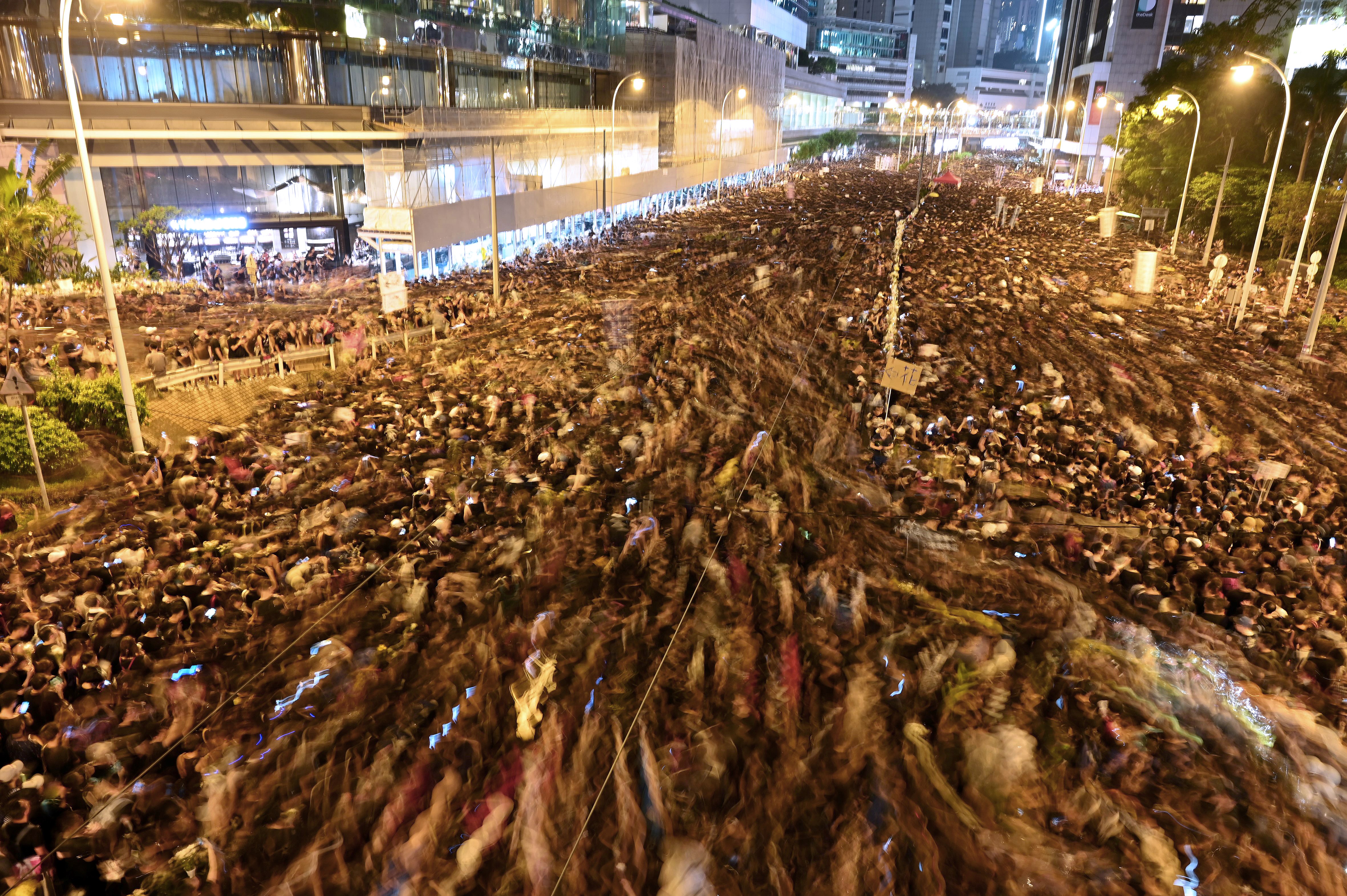 A slow shutter image shows thousands of people taking part in protests in Hong Kong on Sunday.