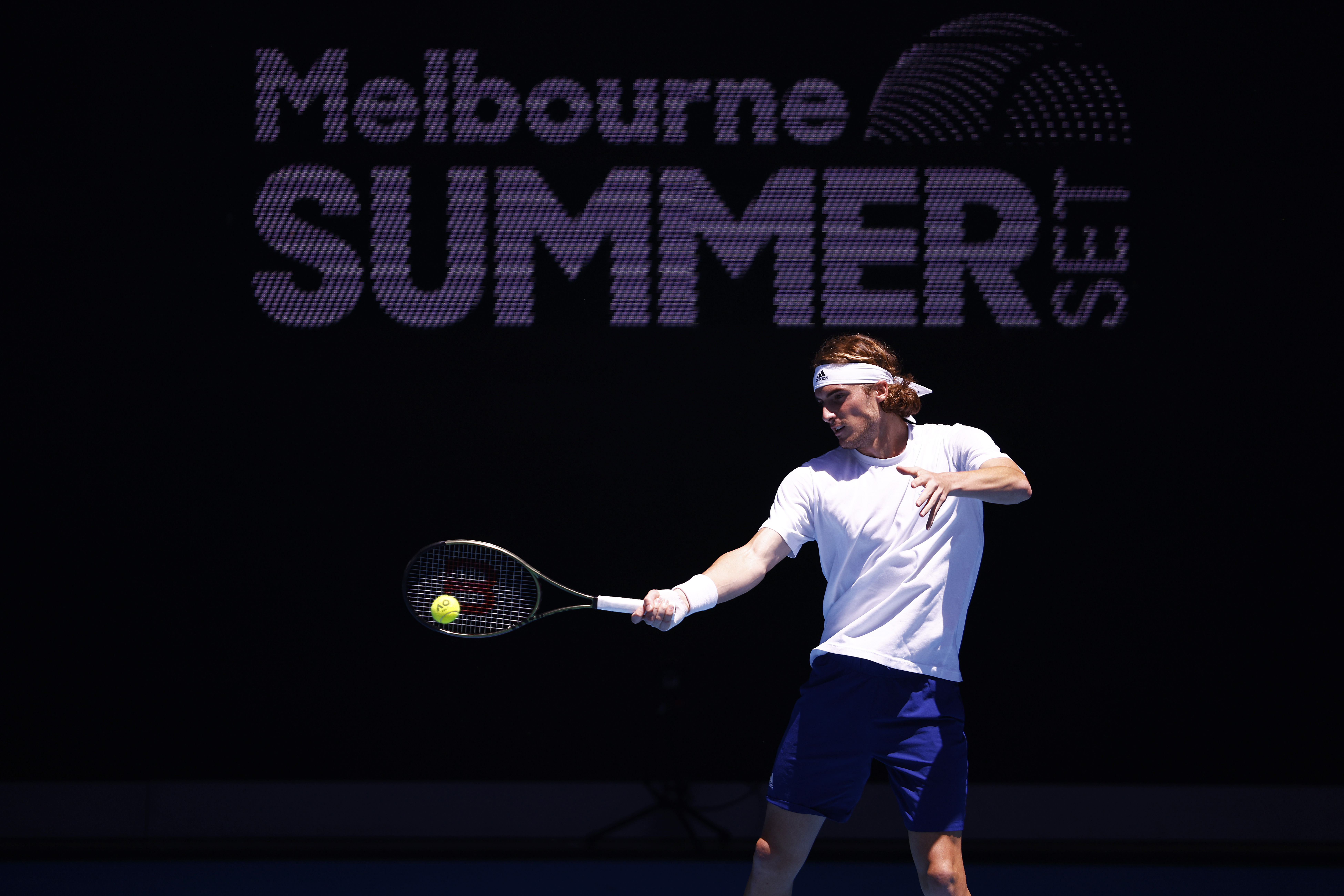 Stefanos Tsitsipas of Greece plays a forehand in a practice session during day seven of the Melbourne Summer Events at Melbourne Park on January 09, 2022 in Melbourne, Australia. 