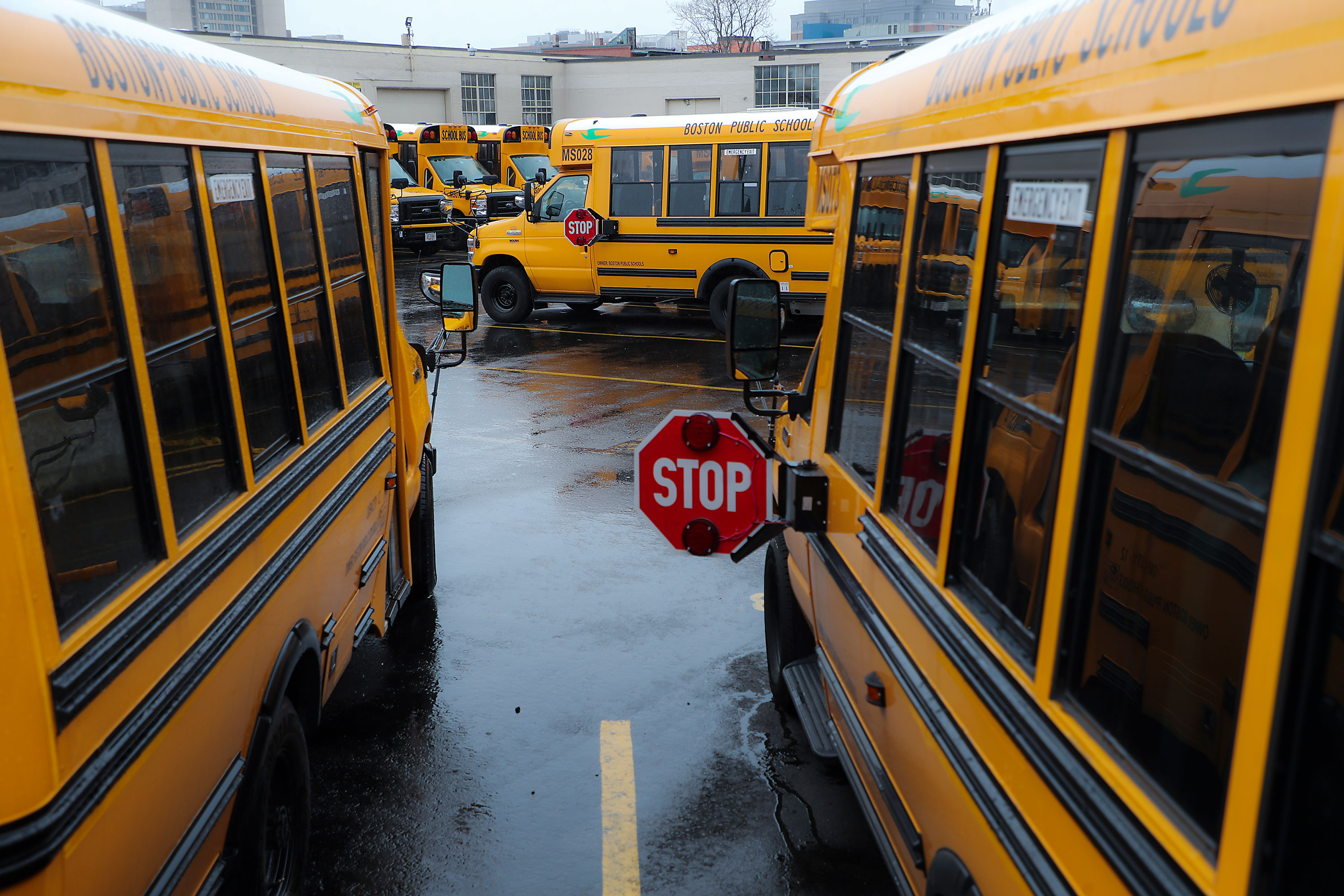 School buses are parked at First Student Inc. in Boston on April 21.