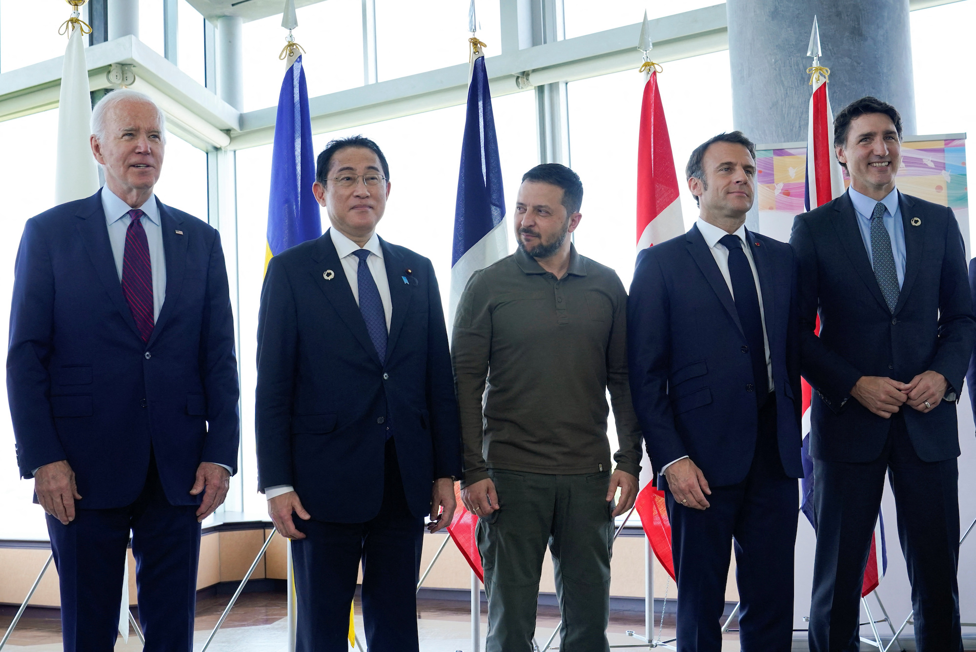 World leaders pose for a photo with Ukrainian President Volodymyr Zelensky before a working session during the G7 Summit in Hiroshima on Sunday.