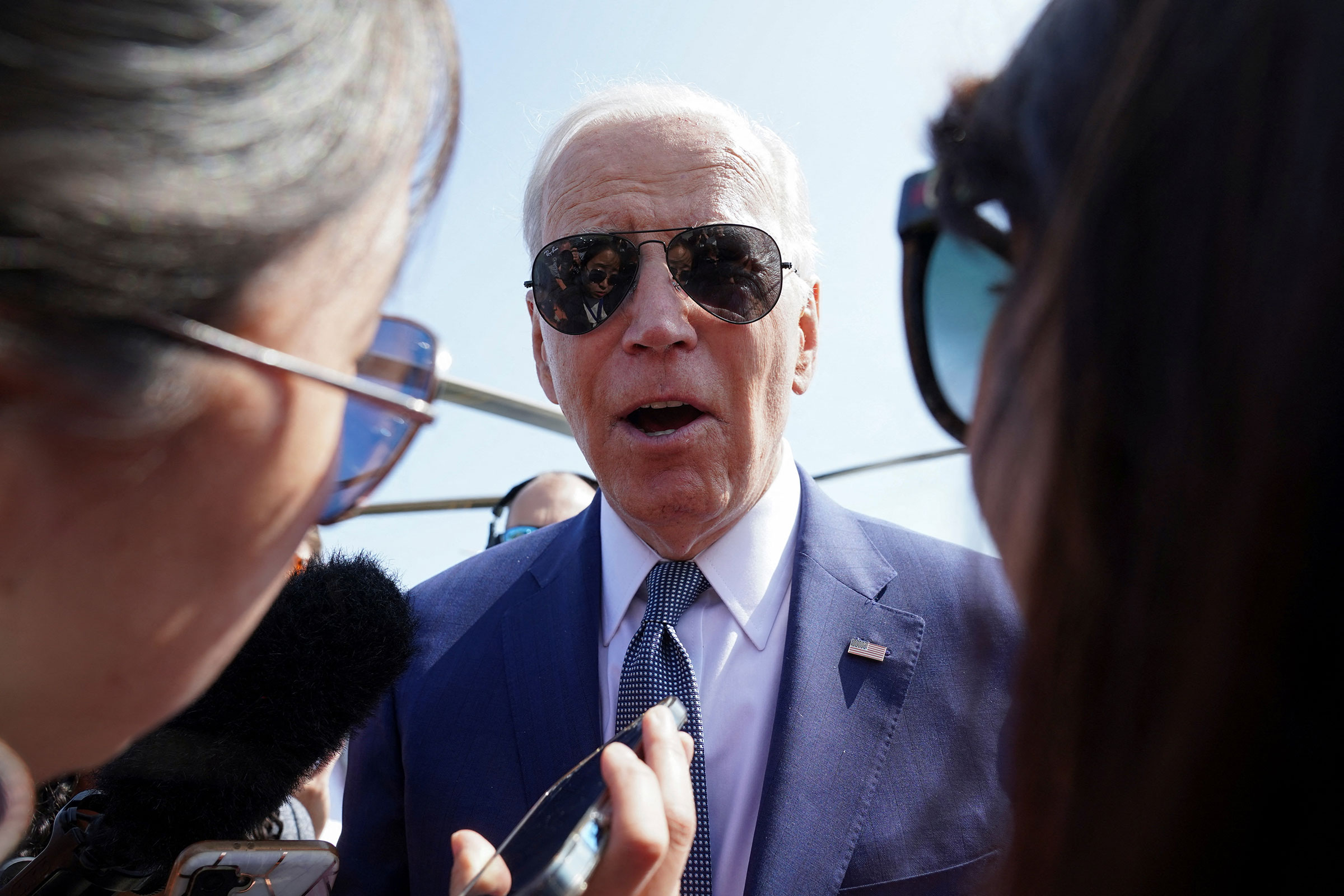 President Joe Biden talks to reporters after delivering remarks on the federal government's debt limit during a visit to SUNY Westchester Community College Valhalla as he departs Westchester Airport in White Plains, New York, on May 10.