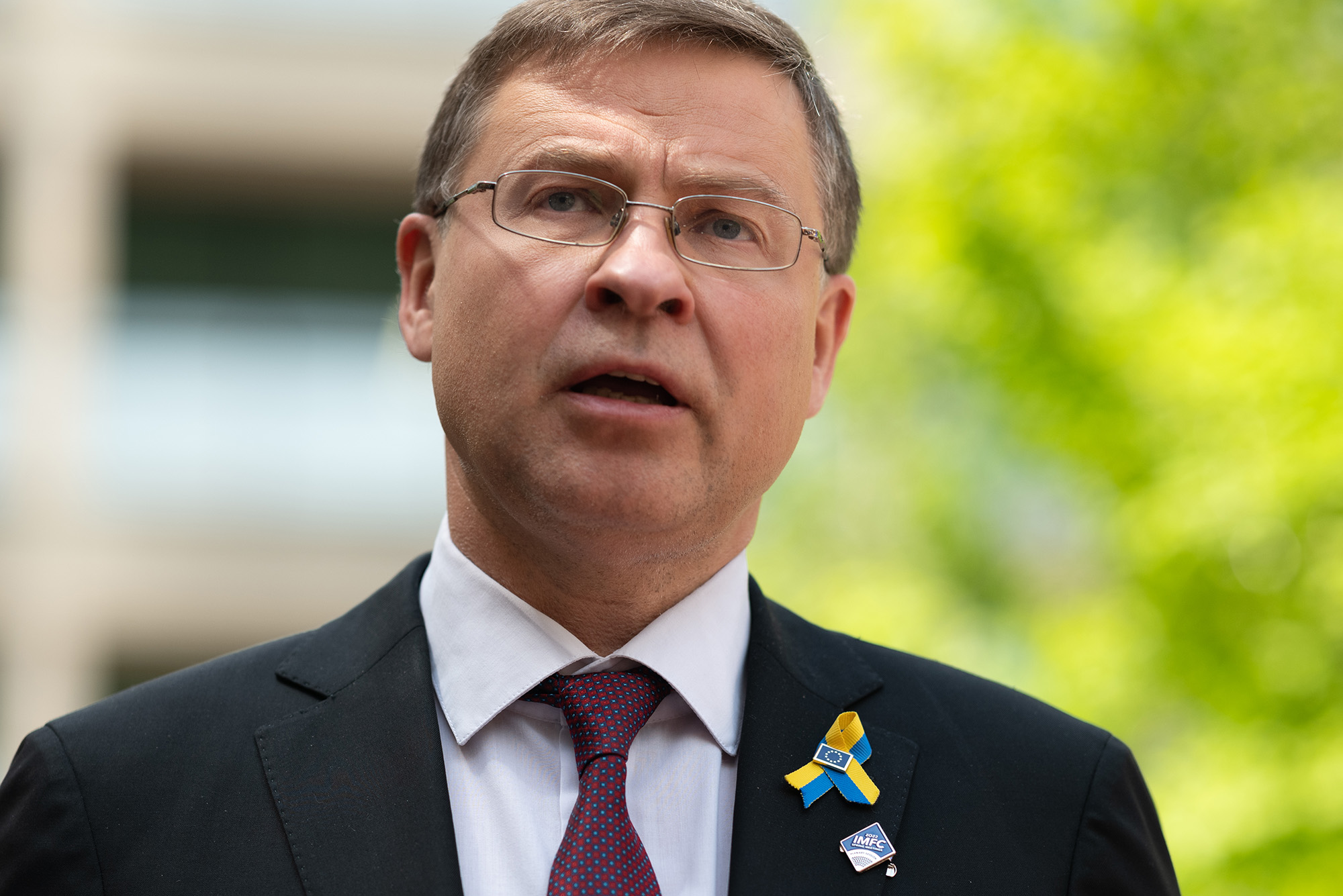 European Commissioner for Trade Valdis Dombrovskis speaks with the media in Washington on Thursday April 21.