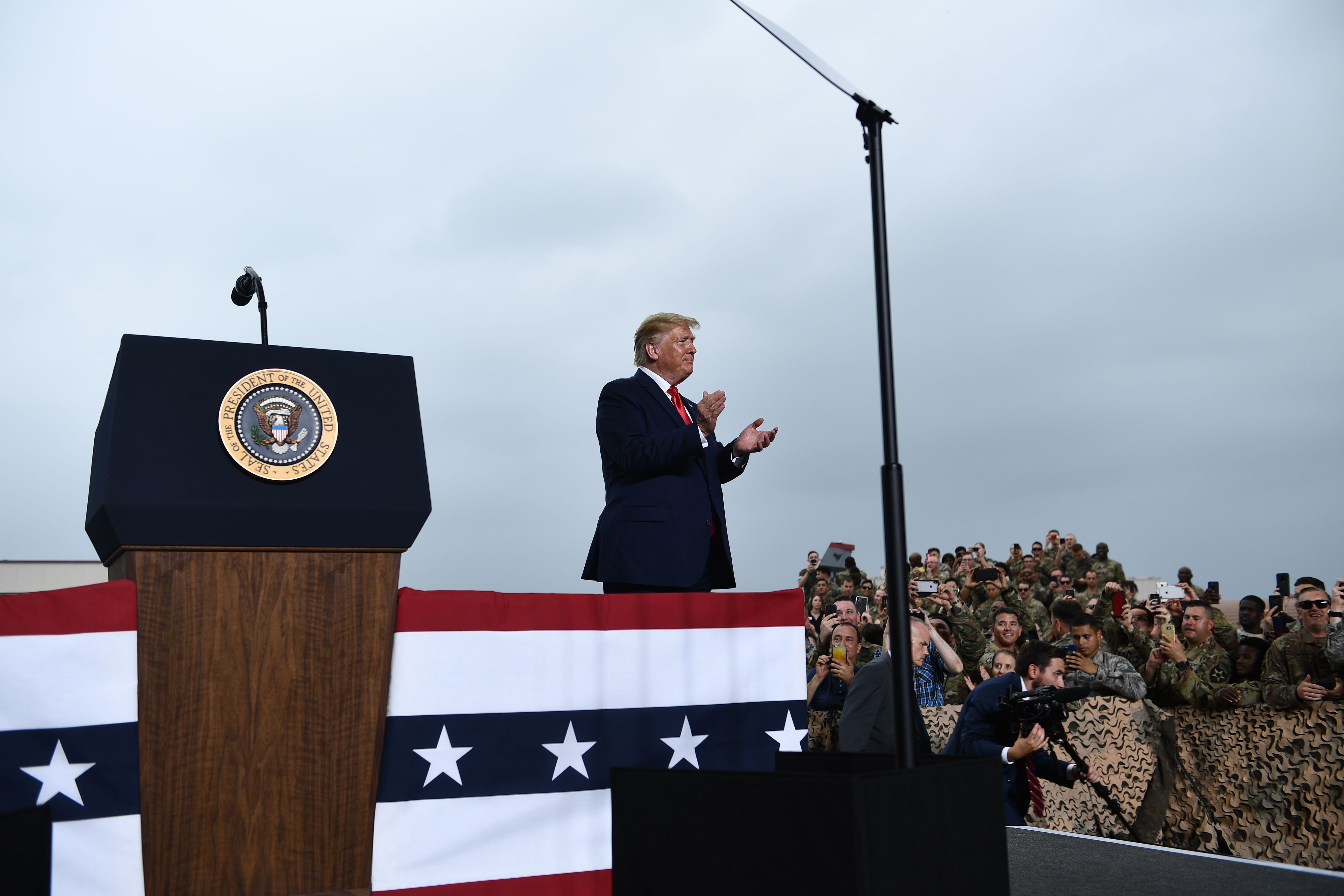 US President Donald Trump with US service members stationed in South Korea in Osan Air Base.