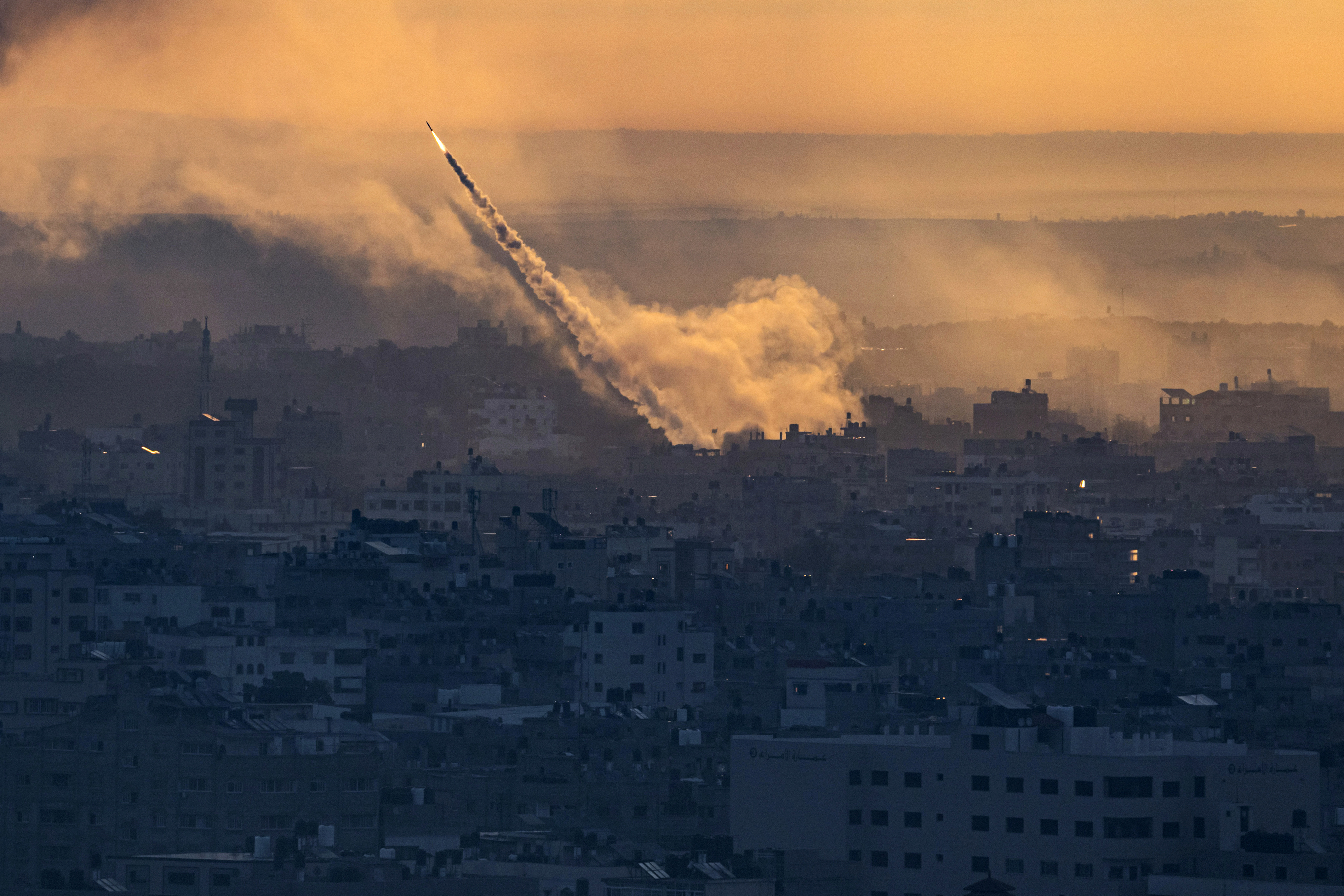 Rockets are fired toward Israel from the enclave of Gaza on October 7.