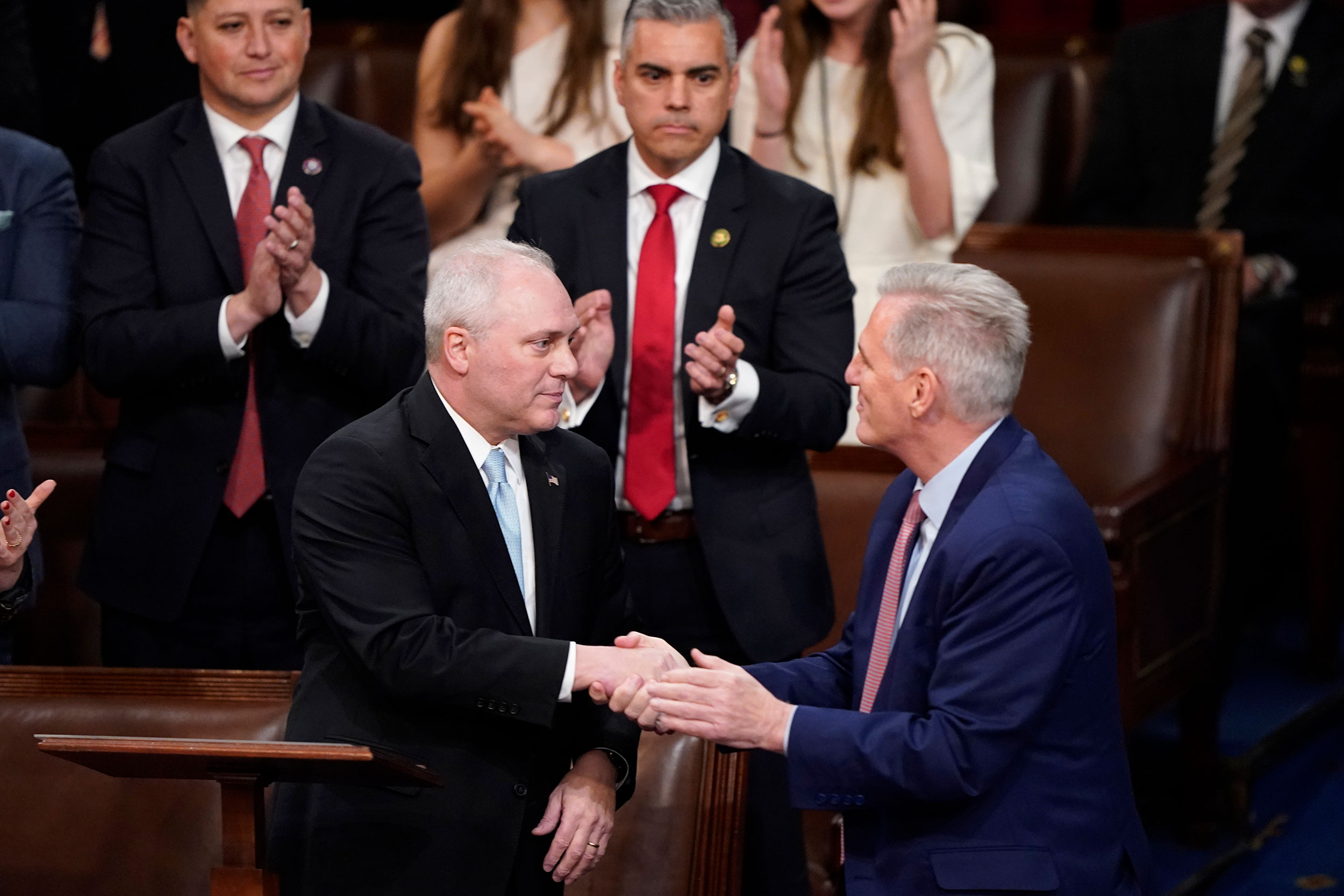 Rep. Steve Scalise, left, shakes hands with Rep. Kevin McCarthy after nominating him for House speaker before Tuesday's third round of voting.