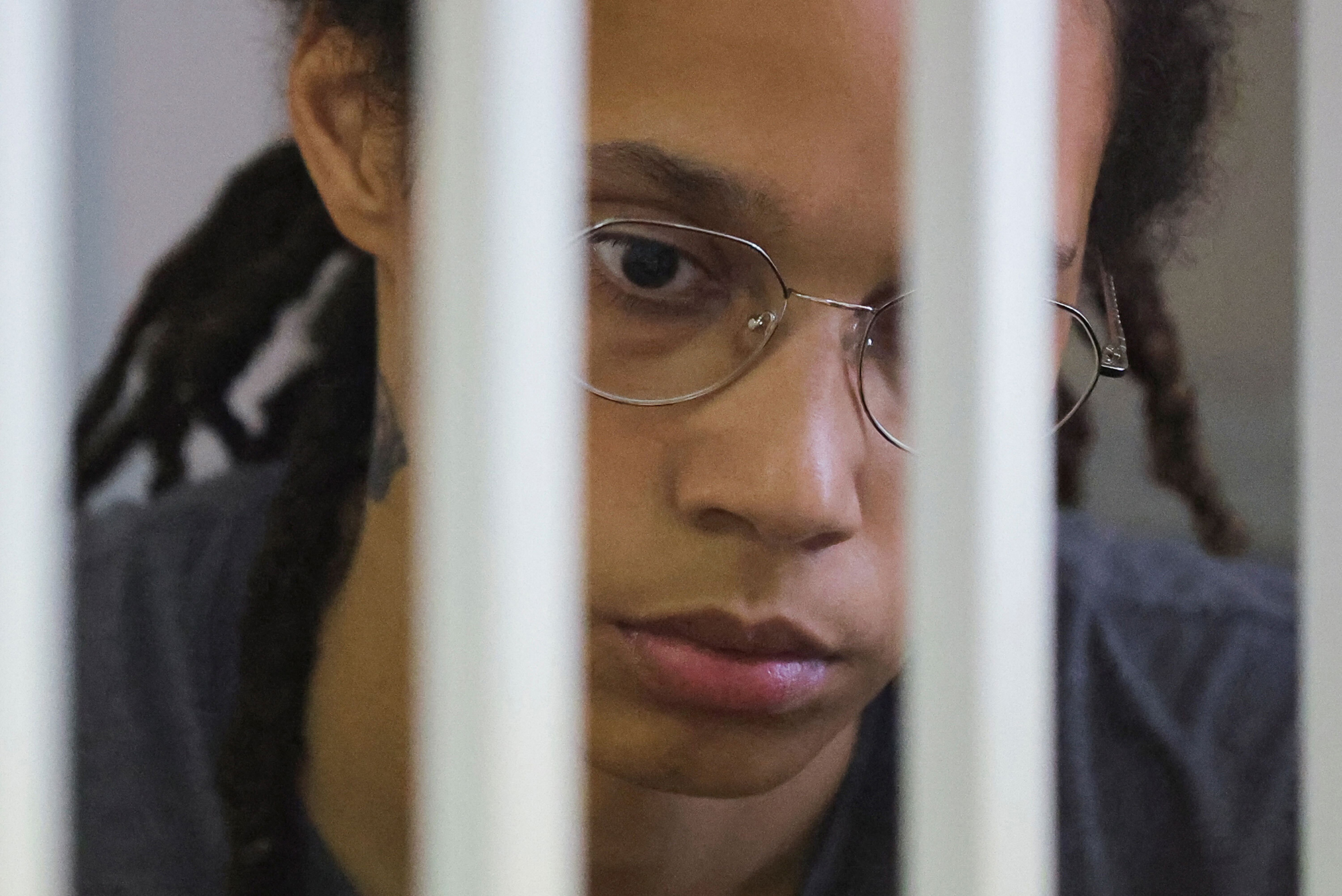 Brittney Griner sits inside a defendants' cage before the court's verdict in Khimki, Russia on August 4. 