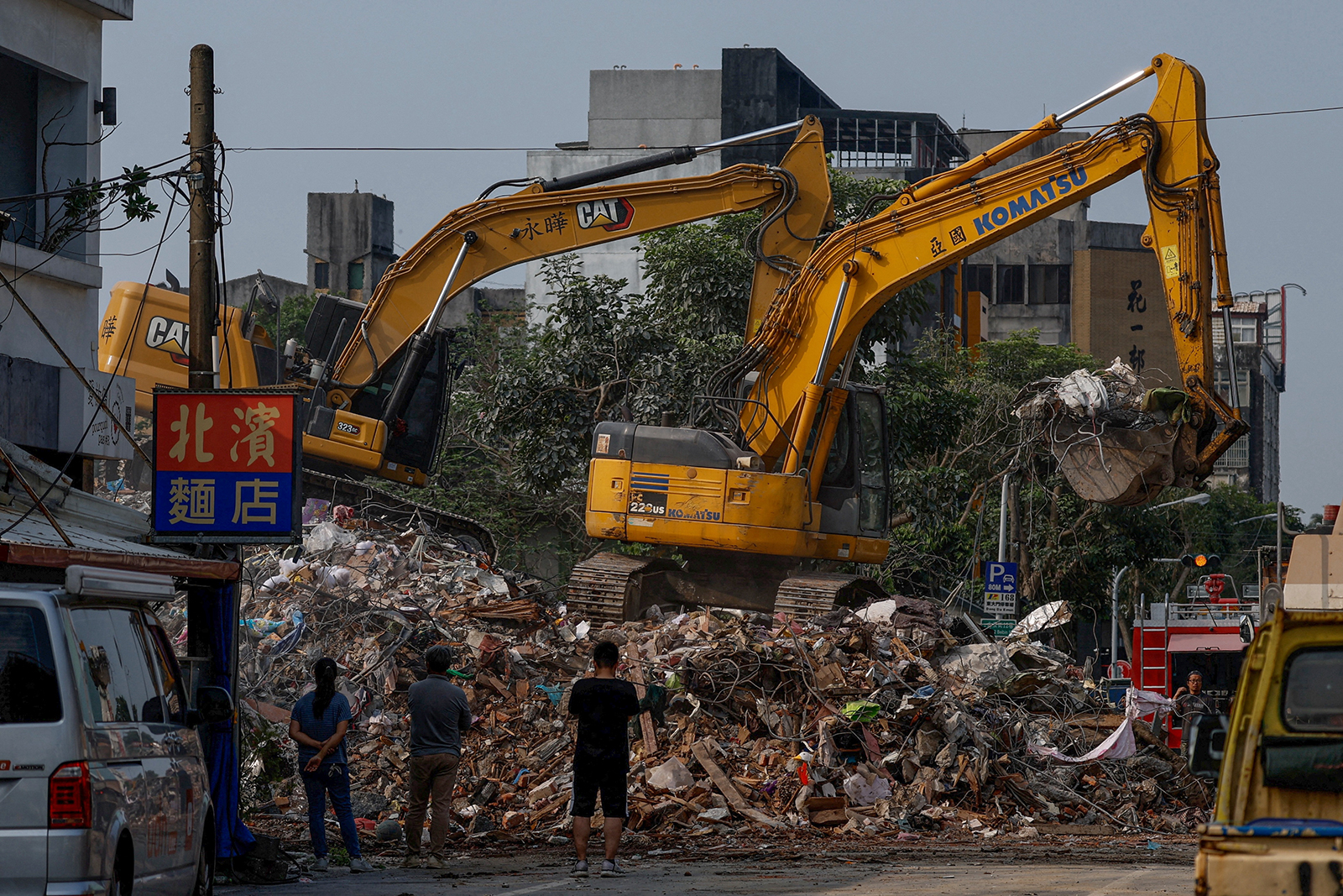 Workers demolish a damaged building following the earthquake, in Hualien, Taiwan April 4.