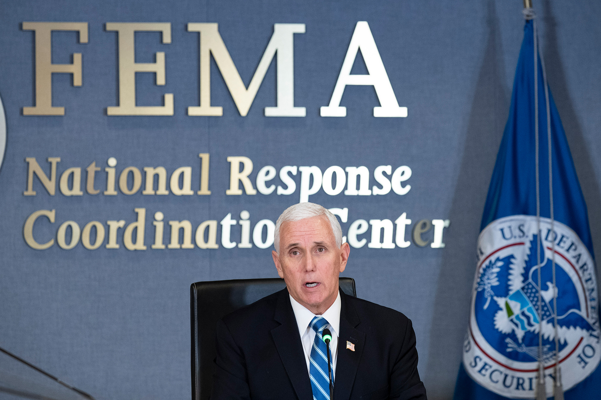 Vice President Mike Pence speaks as he leads a video teleconference with governors about the coronavirus during a trip to FEMA on Monday, March 23, in Washington.