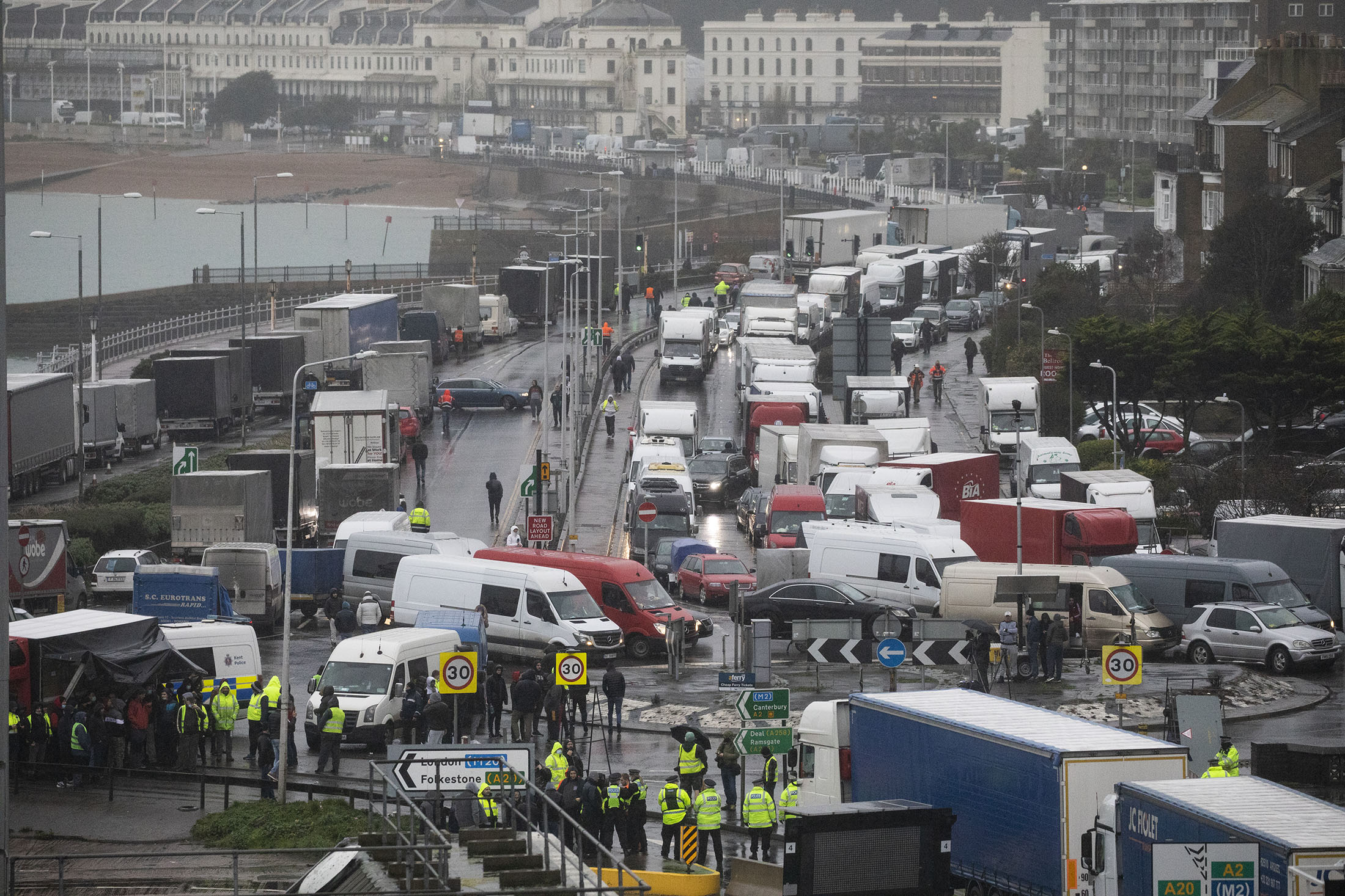 Truckers are stopped by police officers at the Port of Dover on December 23, in Dover, England.