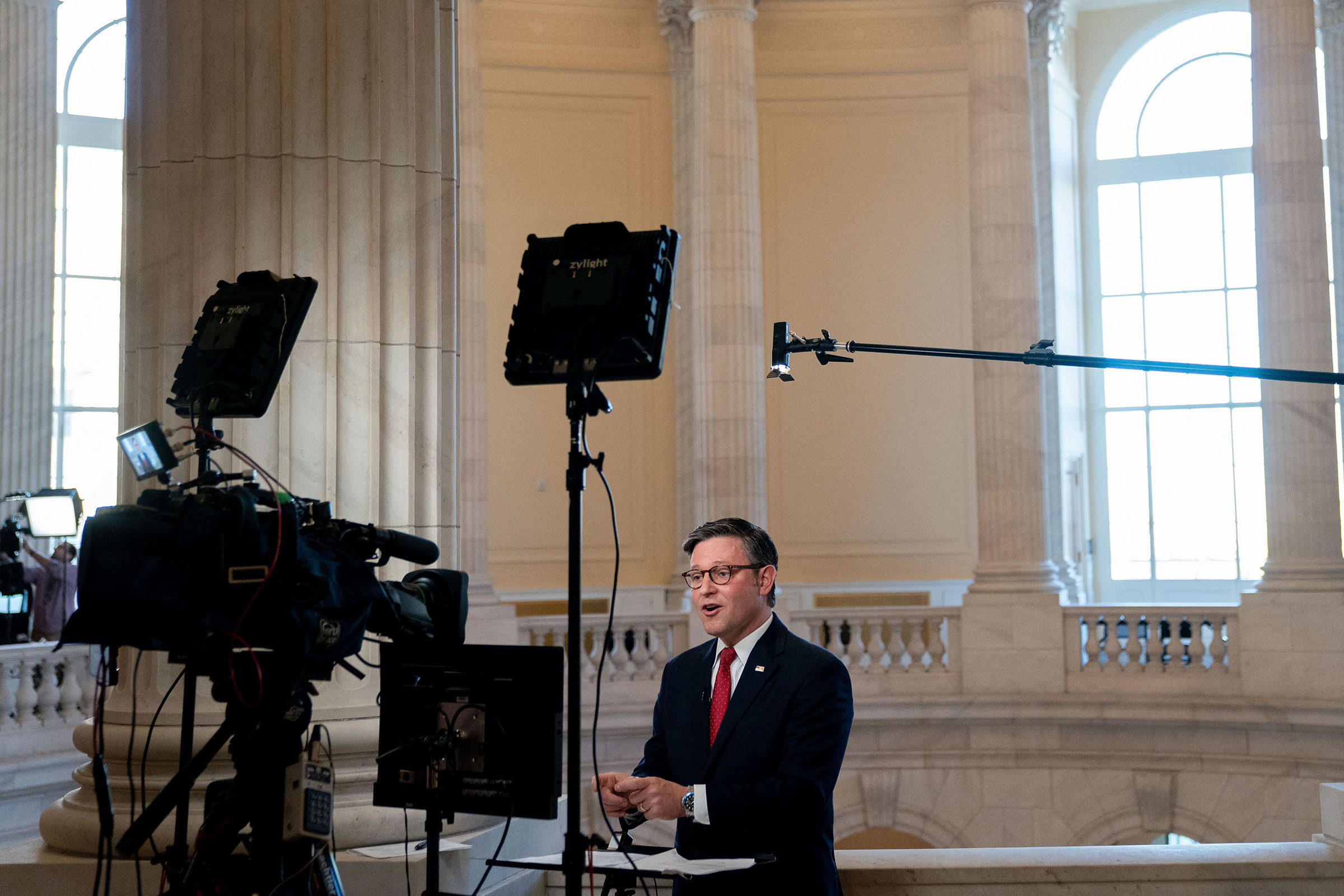 House Speaker Mike Johnson speaks during a television interview on Capitol Hill in Washington, DC, on November 14.