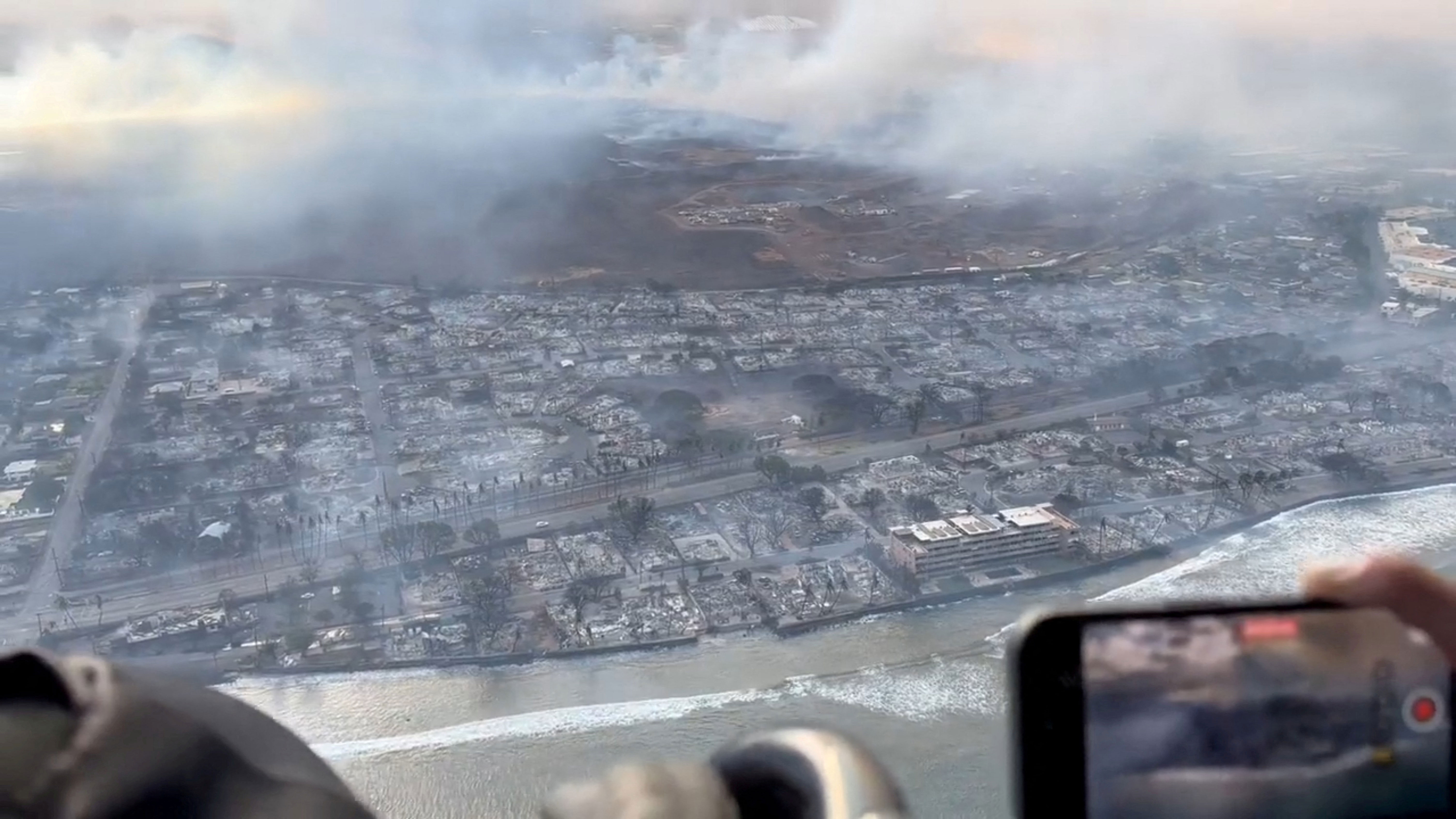 An aerial view shows damage along the coast of Lahaina in the aftermath of wildfires in Maui, Hawaii, on August 9, 2023 in this screen grab obtained from social media video.