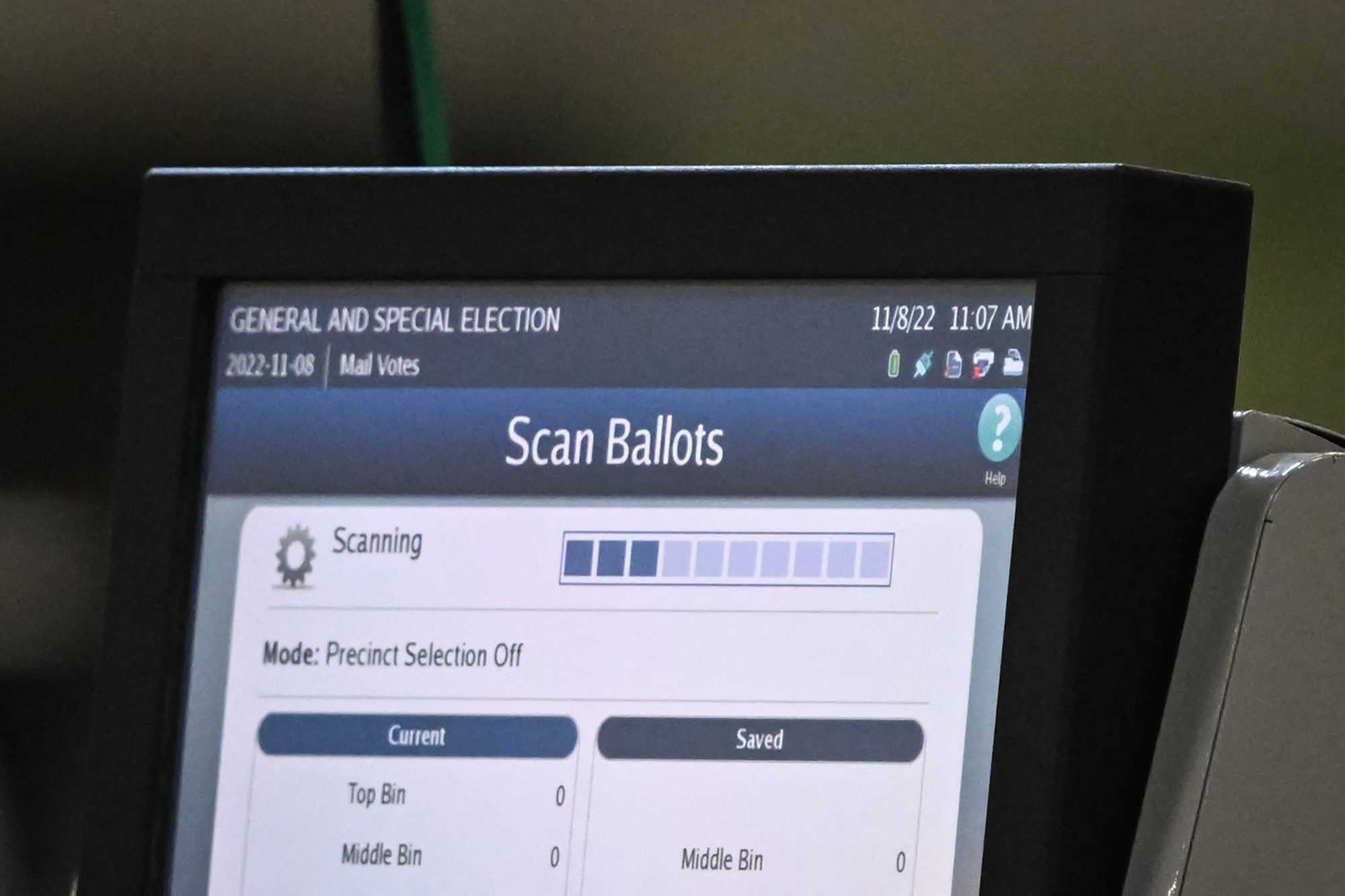 A machine scans ballots at an elections warehouse outside of Philadelphia on Tuesday.