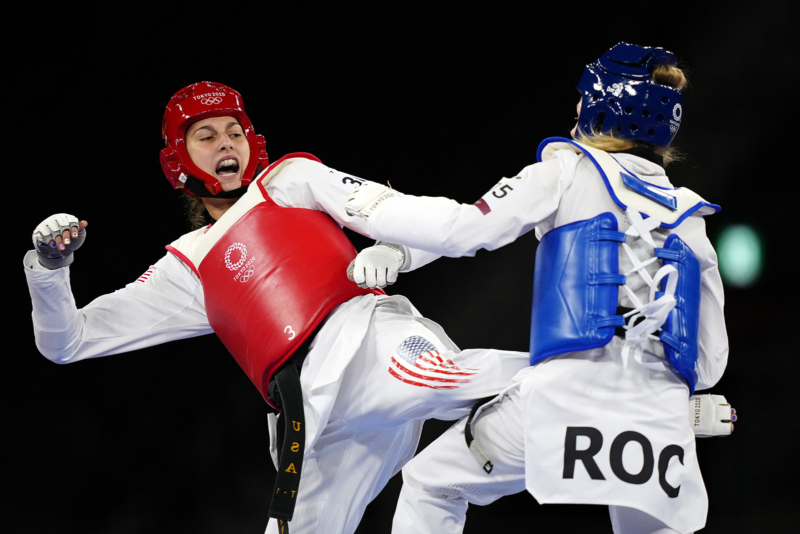 Anastasija Zolotic of the United States competes in a Taekwondo contest against Tatiana Manina of the Russian Olympic Committee on July 25. 