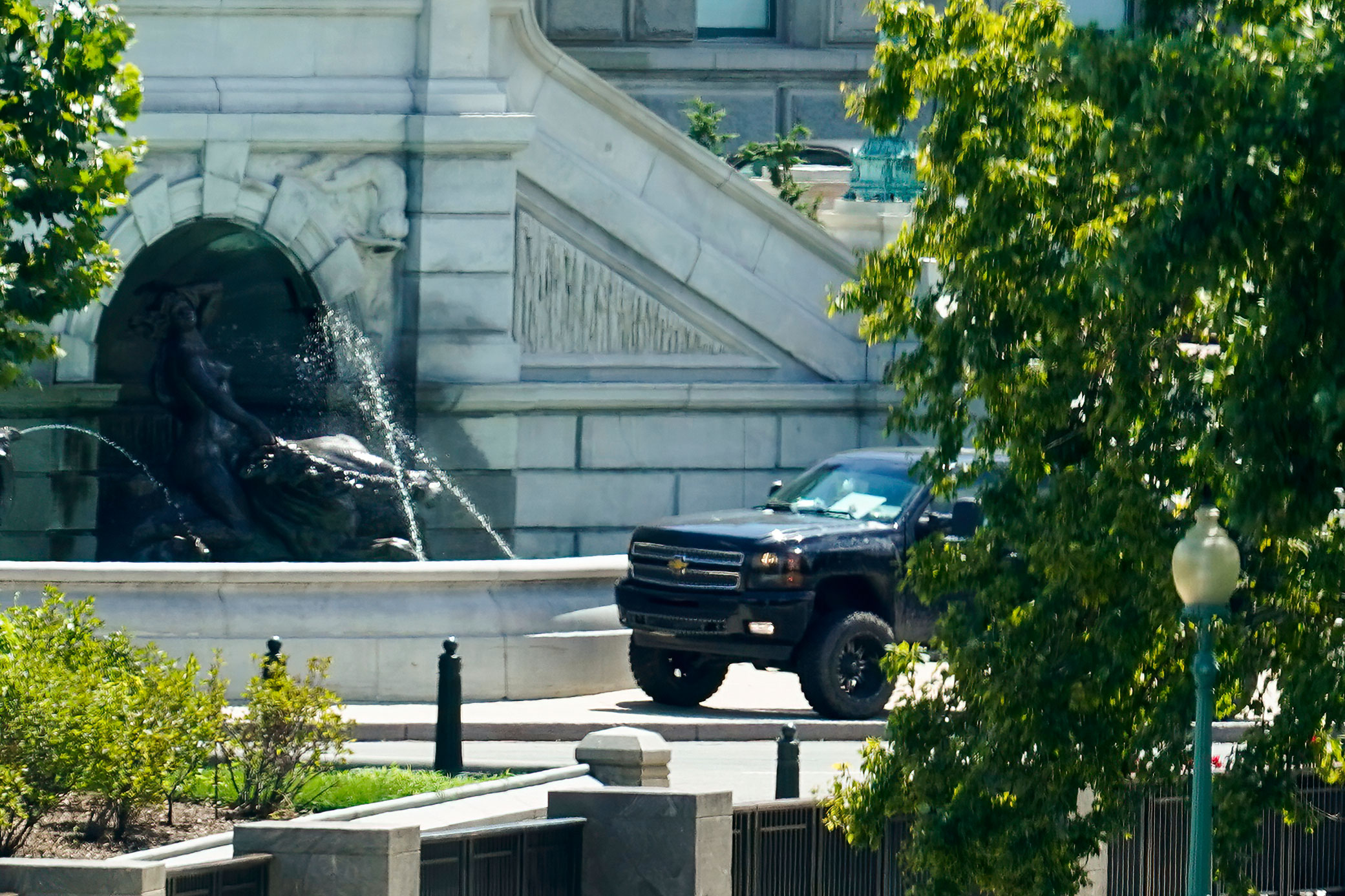 A pickup truck is seen parked on the sidewalk in front of the Library of Congress' Thomas Jefferson Building on August 19.