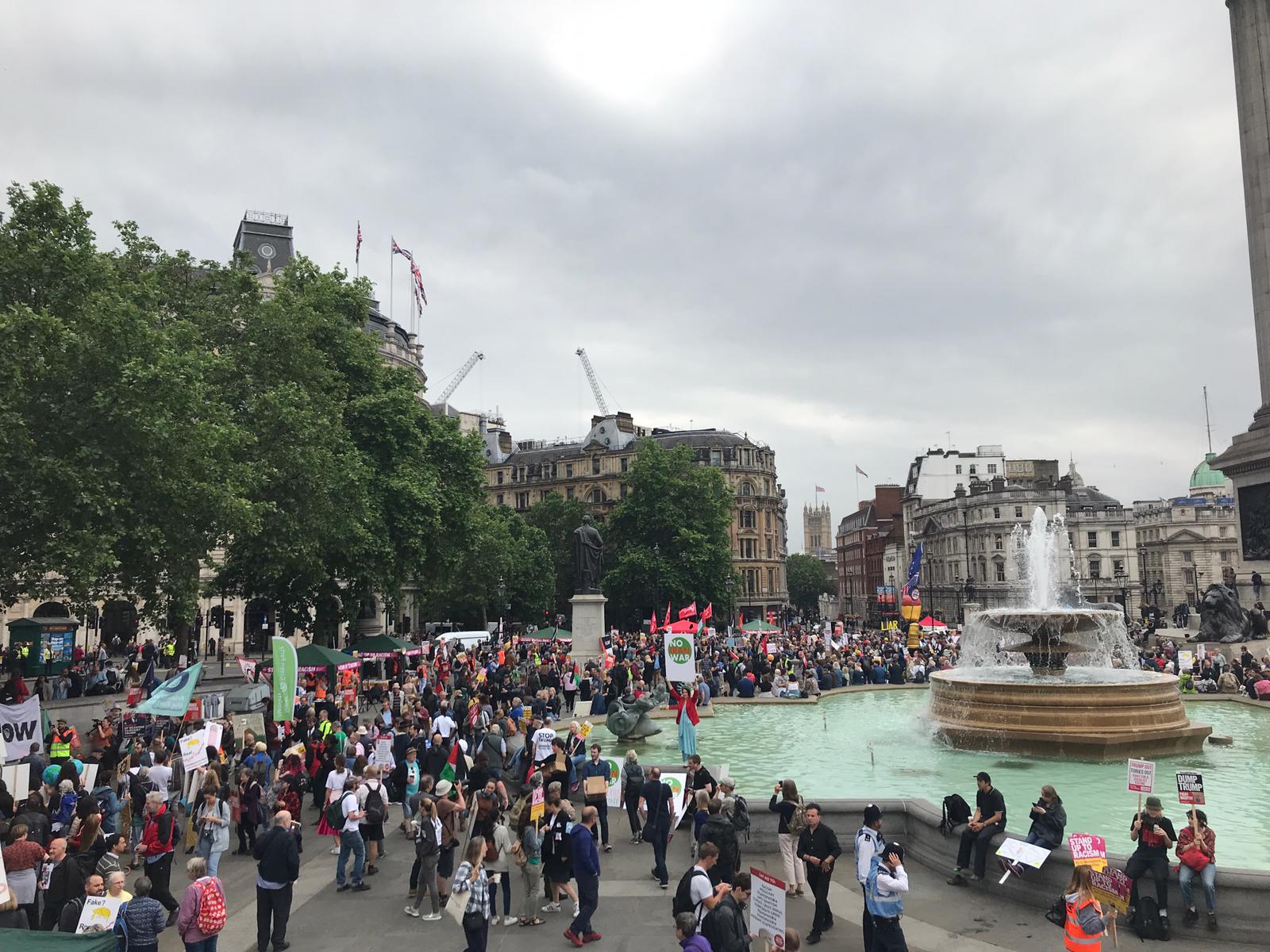 Protesters start to assemble in Trafalgar Square.