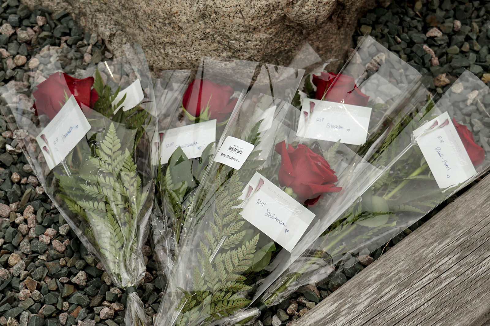 Flowers for the crew of the Titan are seen at the port of St John's in Newfoundland, Canada, on Friday. 
