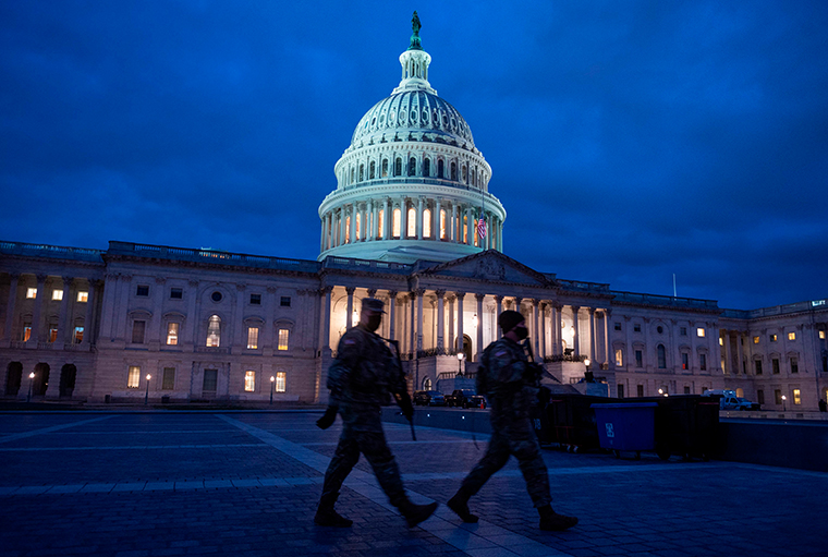 Members of the US National Guard patrol at the US Capitol in Washington, DC on January 17, 2021.